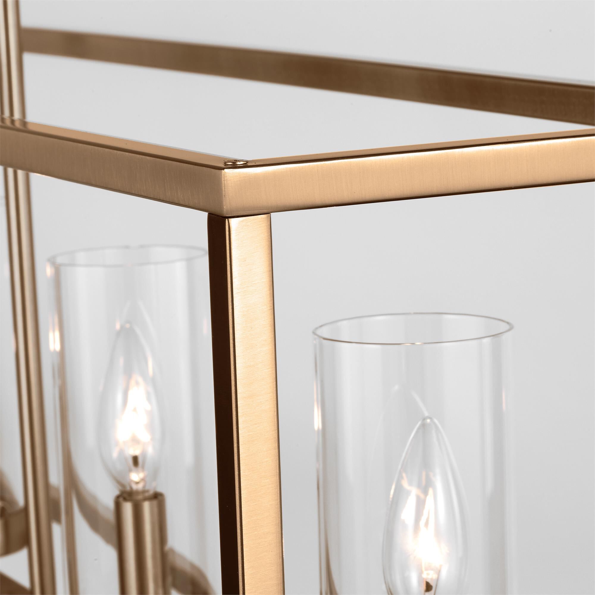 Shown in Satin Brass finish and Clear Glass s shade