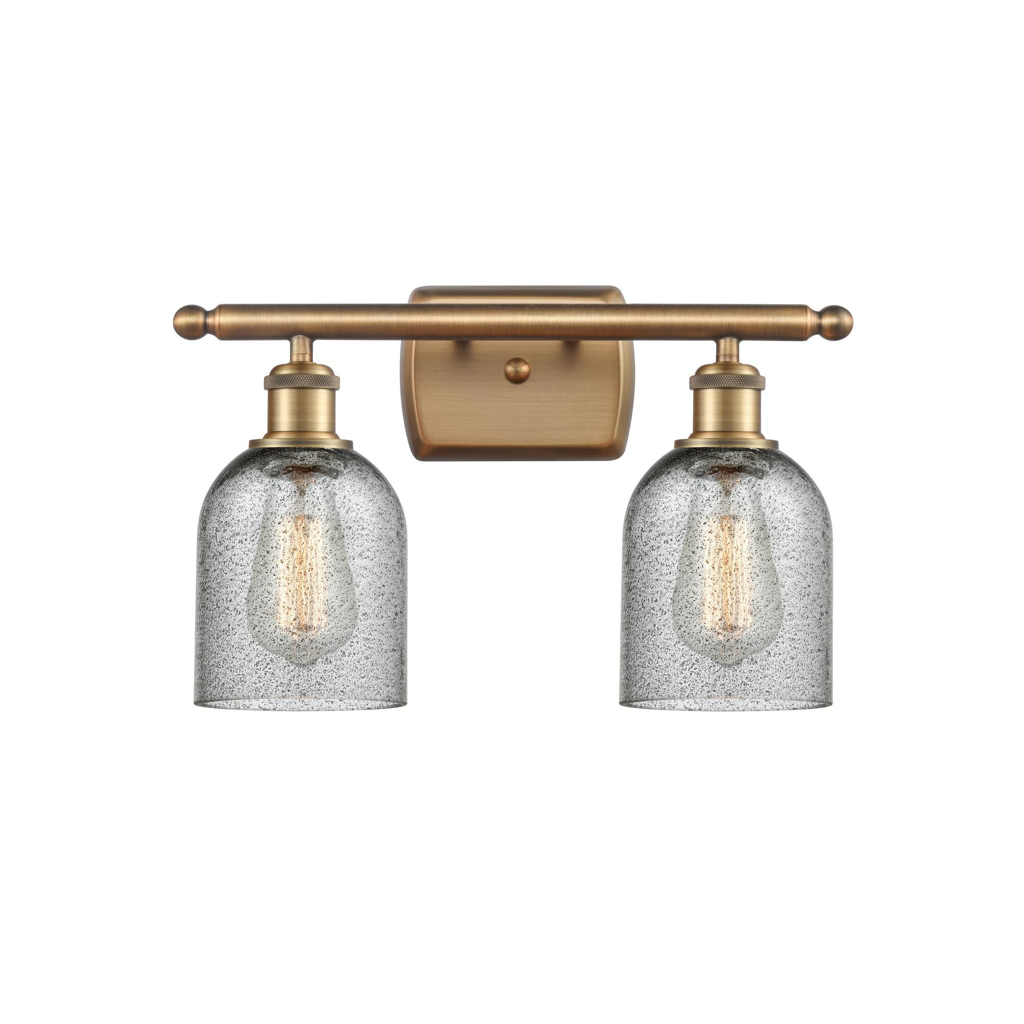 Shown in Brushed Brass finish and Bell glass and Glass shade and Polished Chrome accent