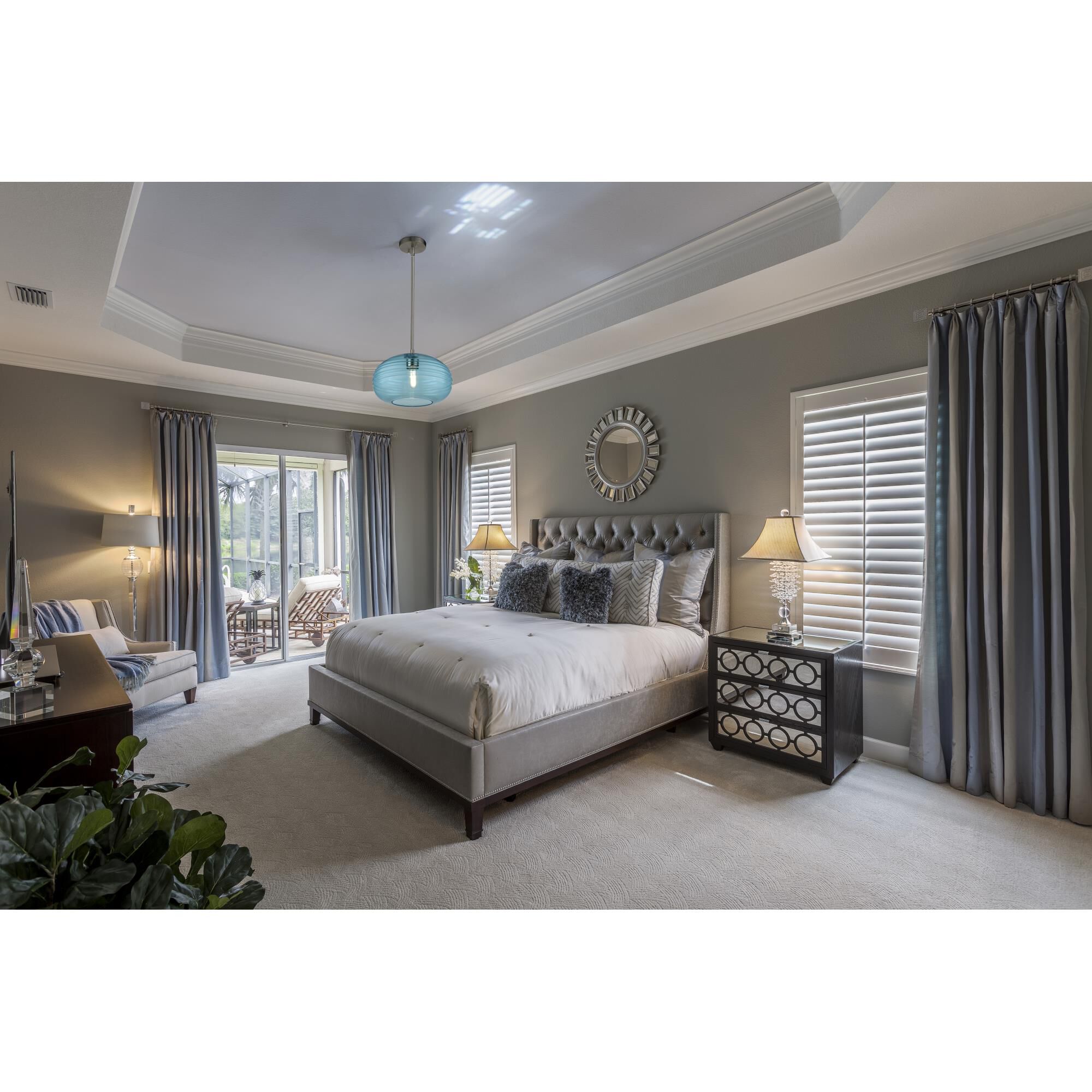 Shown in Brushed Nickel finish and Glass shade