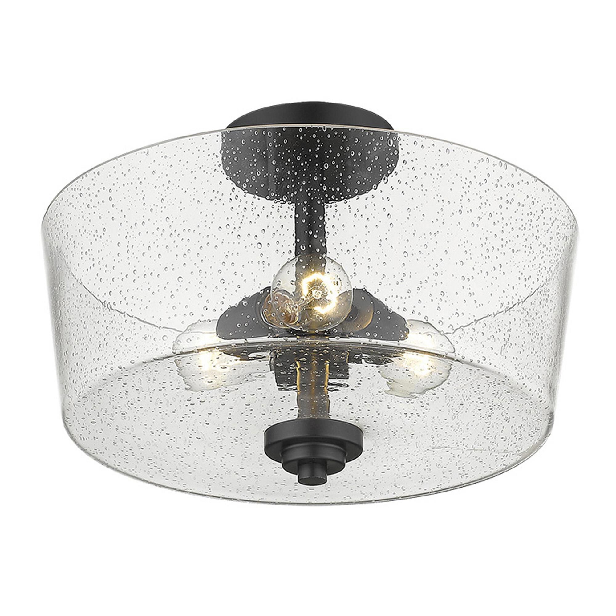Shown in Matte Black finish and Clear glass and Clear, Seeded Drum Shaped Glass shade