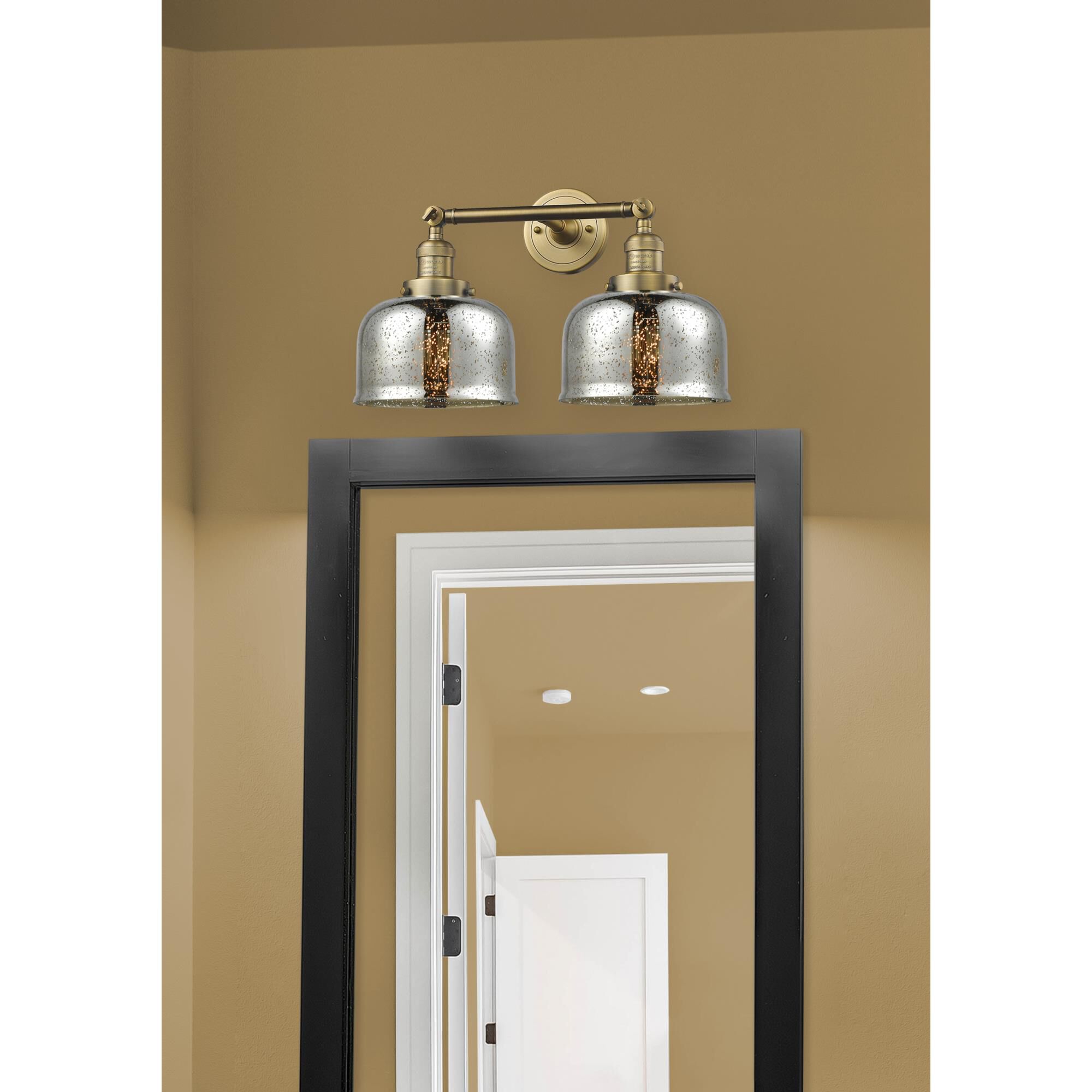 Shown in Brushed Brass finish and Silver Mercury glass