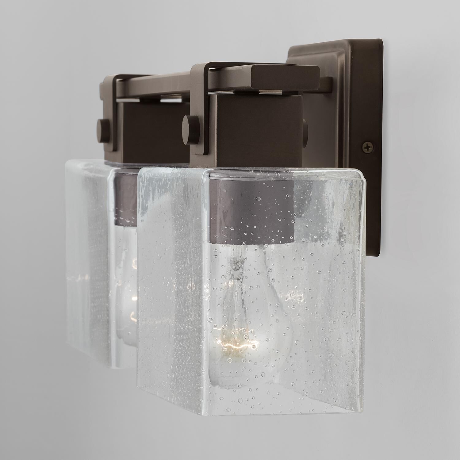 Shown in Oil Rubbed Bronze finish and Clear Seeded glass