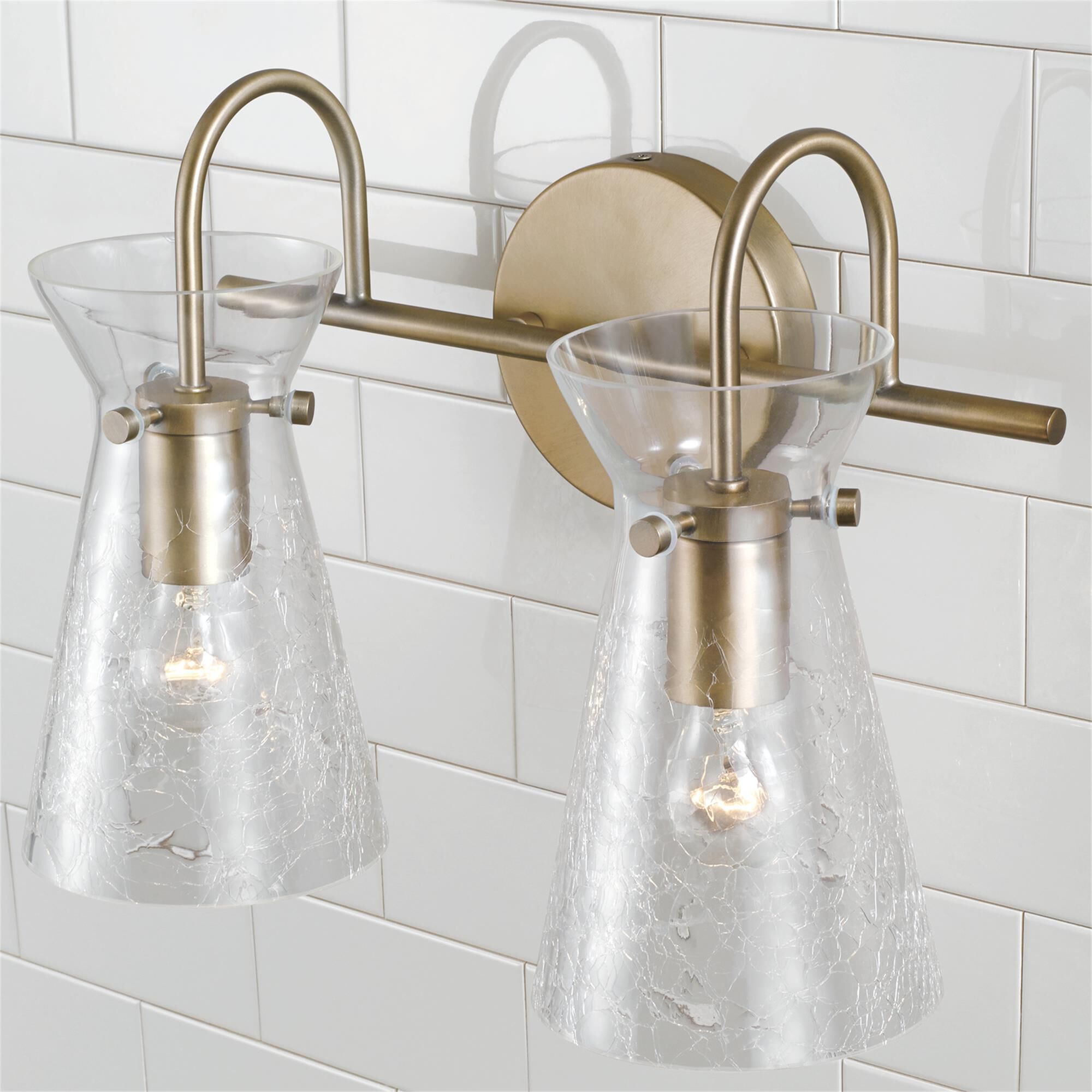 Shown in Aged Brass finish and Clear Half-Crackle glass