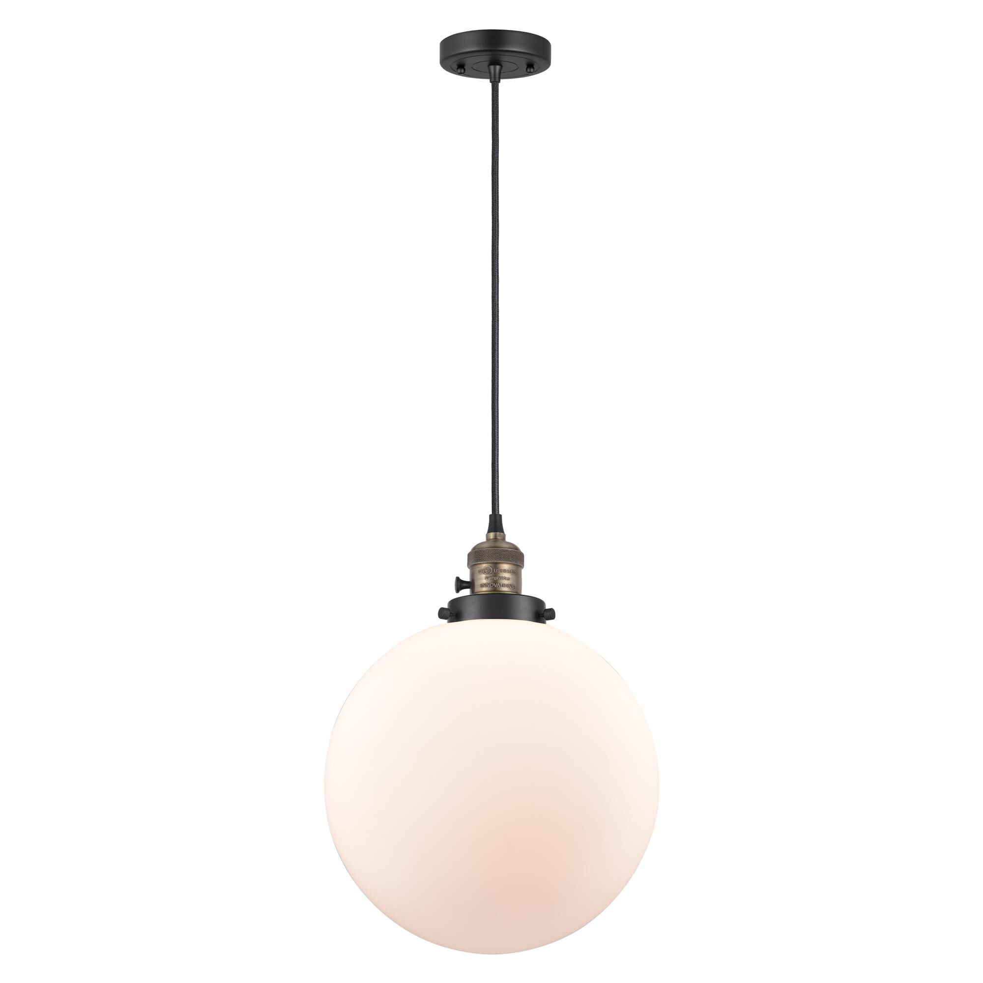Shown in Black Antique Brass finish and Matte White Cased glass