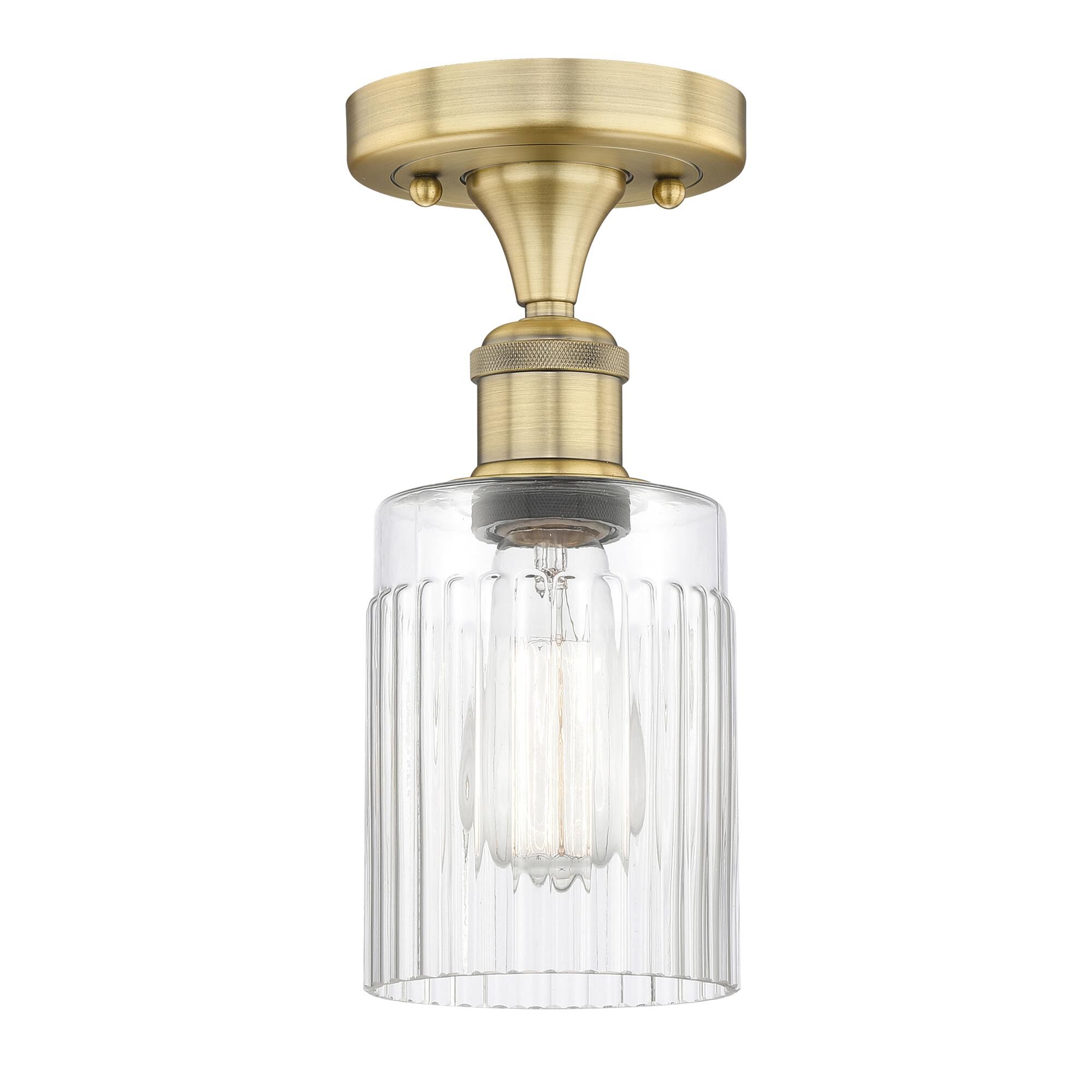 Shown in Brushed Brass finish and Clear glass