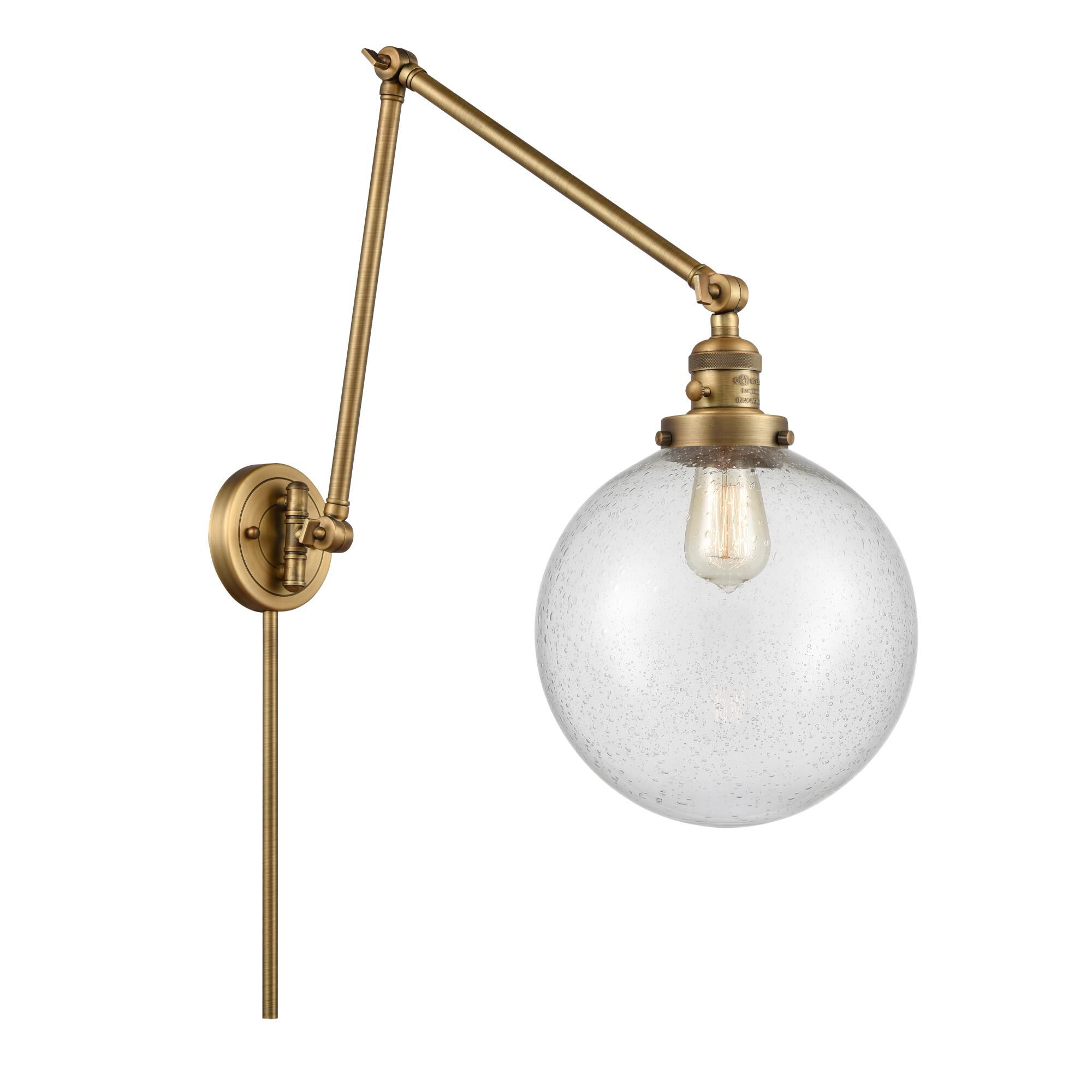Shown in Brushed Brass finish and Seedy Beacon glass