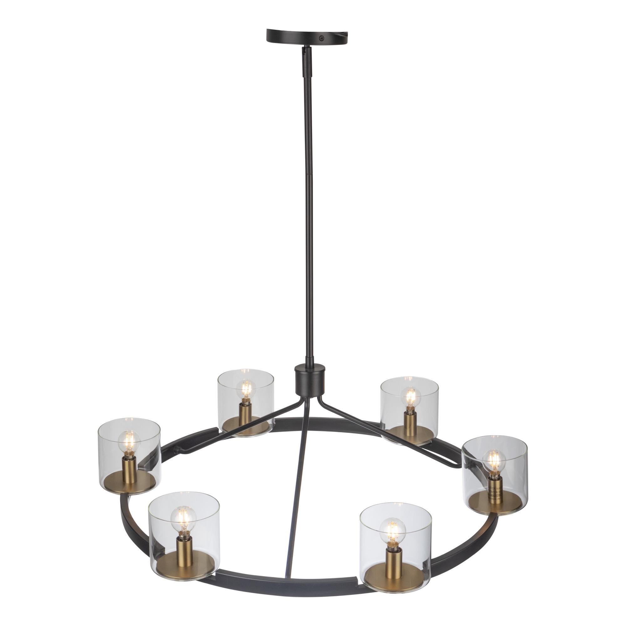 Shown in Black And Brass finish and Glass shade