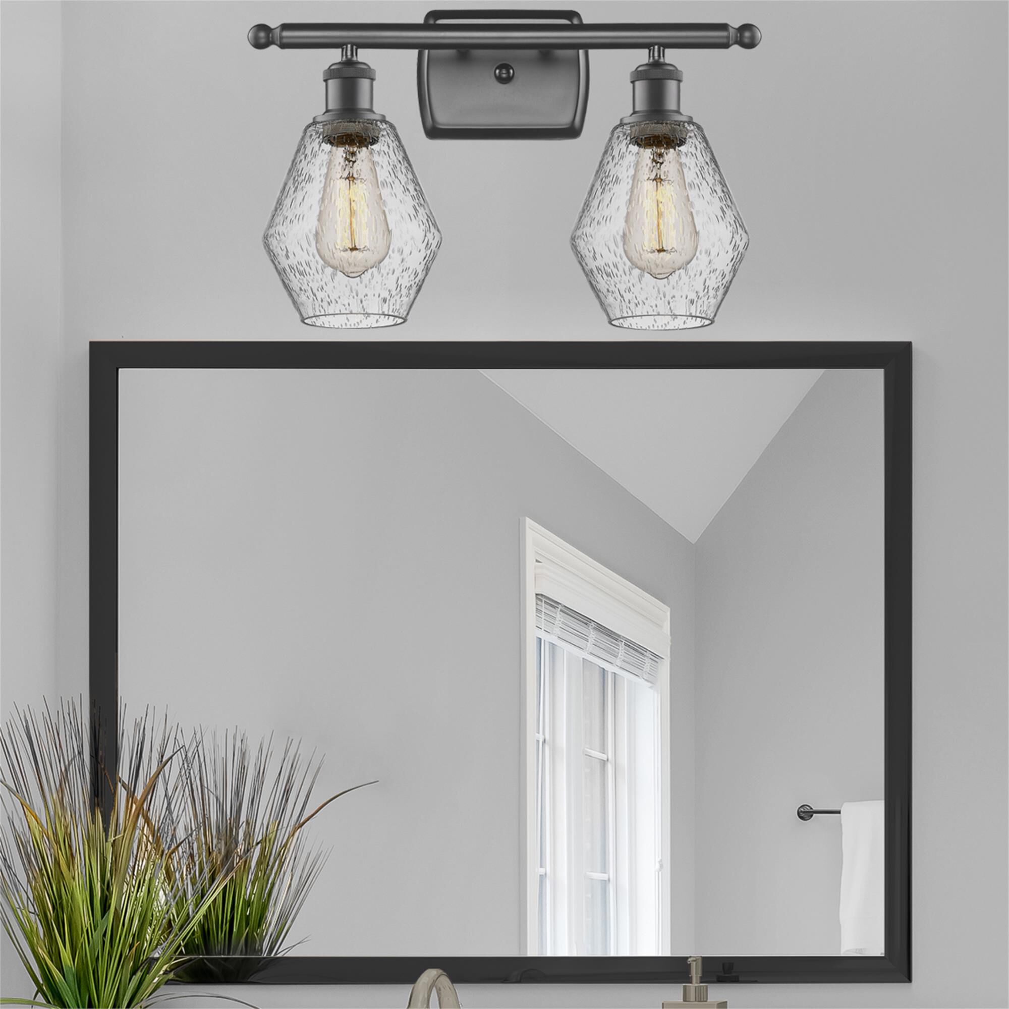 Shown in Oil Rubbed Bronze  finish and Seedy glass