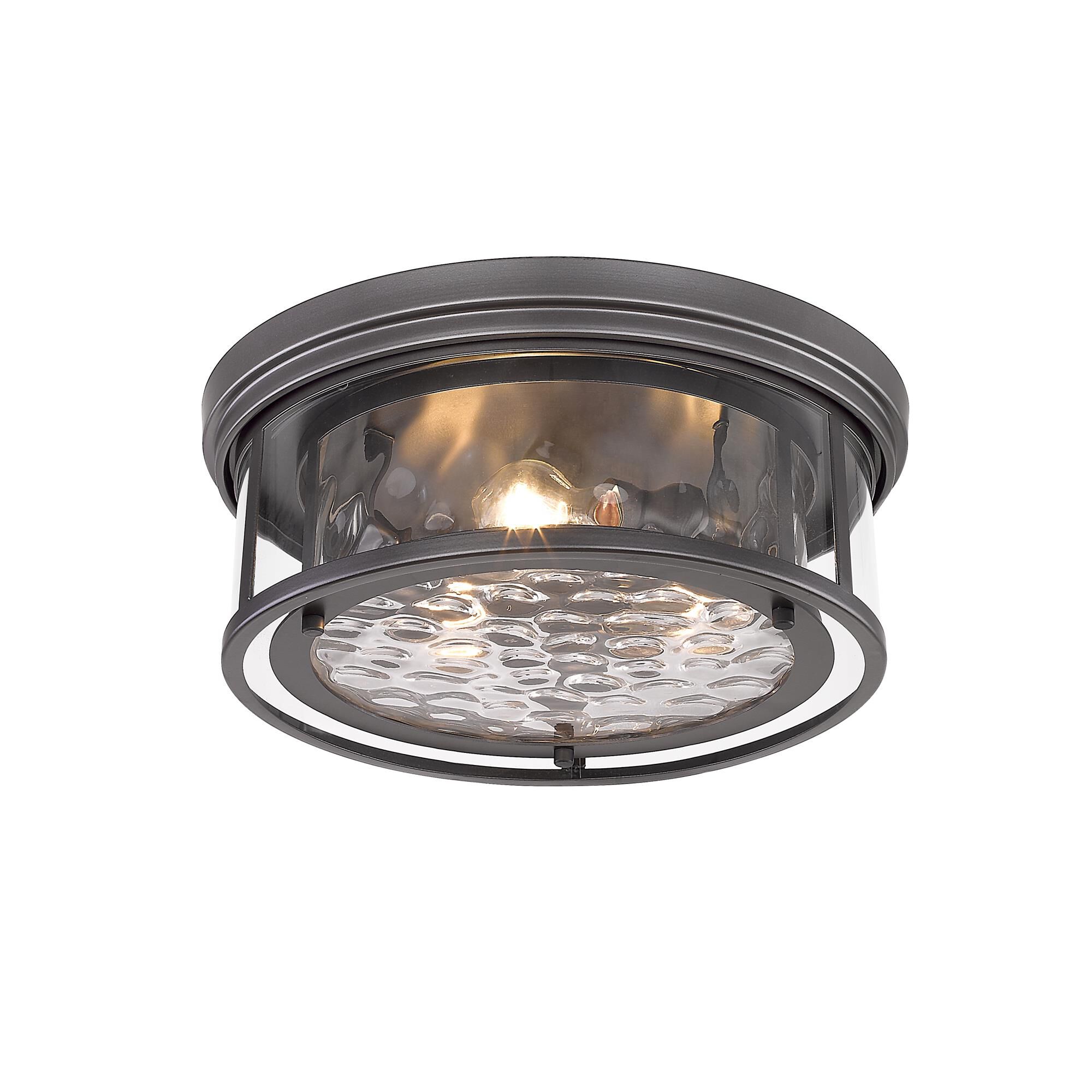 Shown in Bronze finish and Glass shade