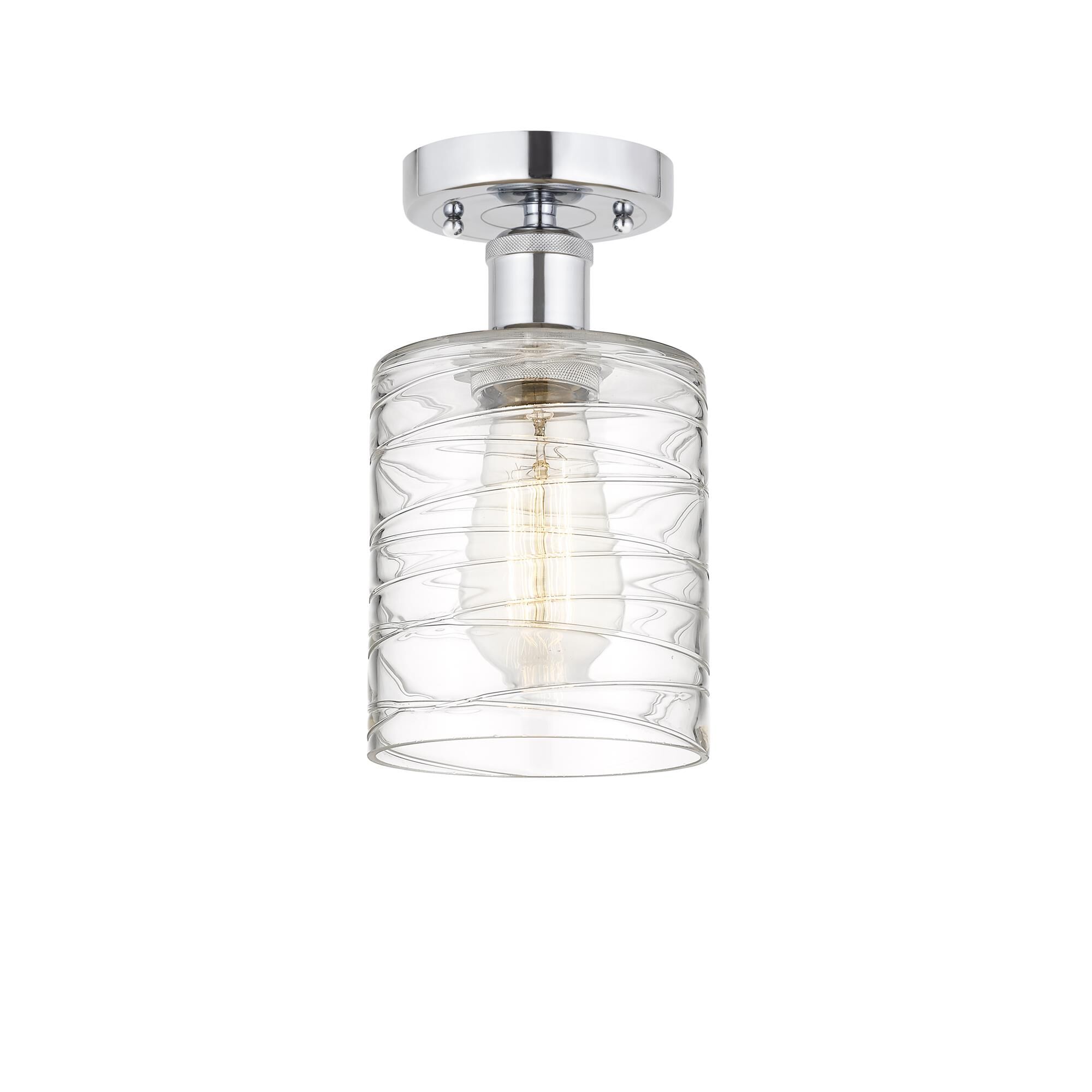 Shown in Polished Chrome finish and Deco Swirl glass