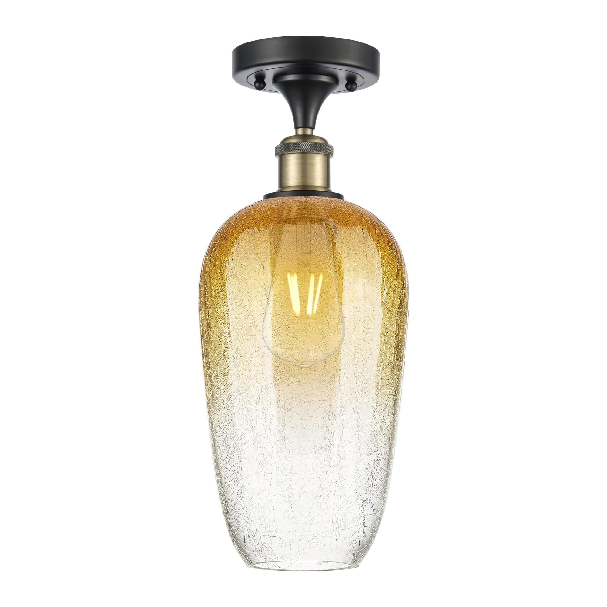 Shown in Black Antique Brass finish and Amber glass