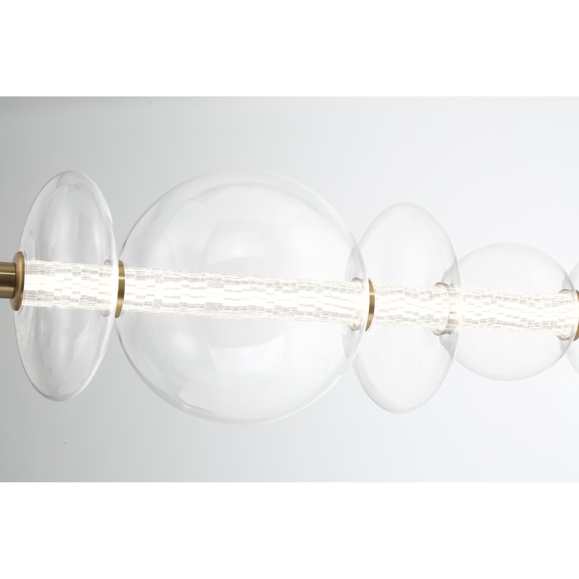 Shown in Gold finish and Clear glass