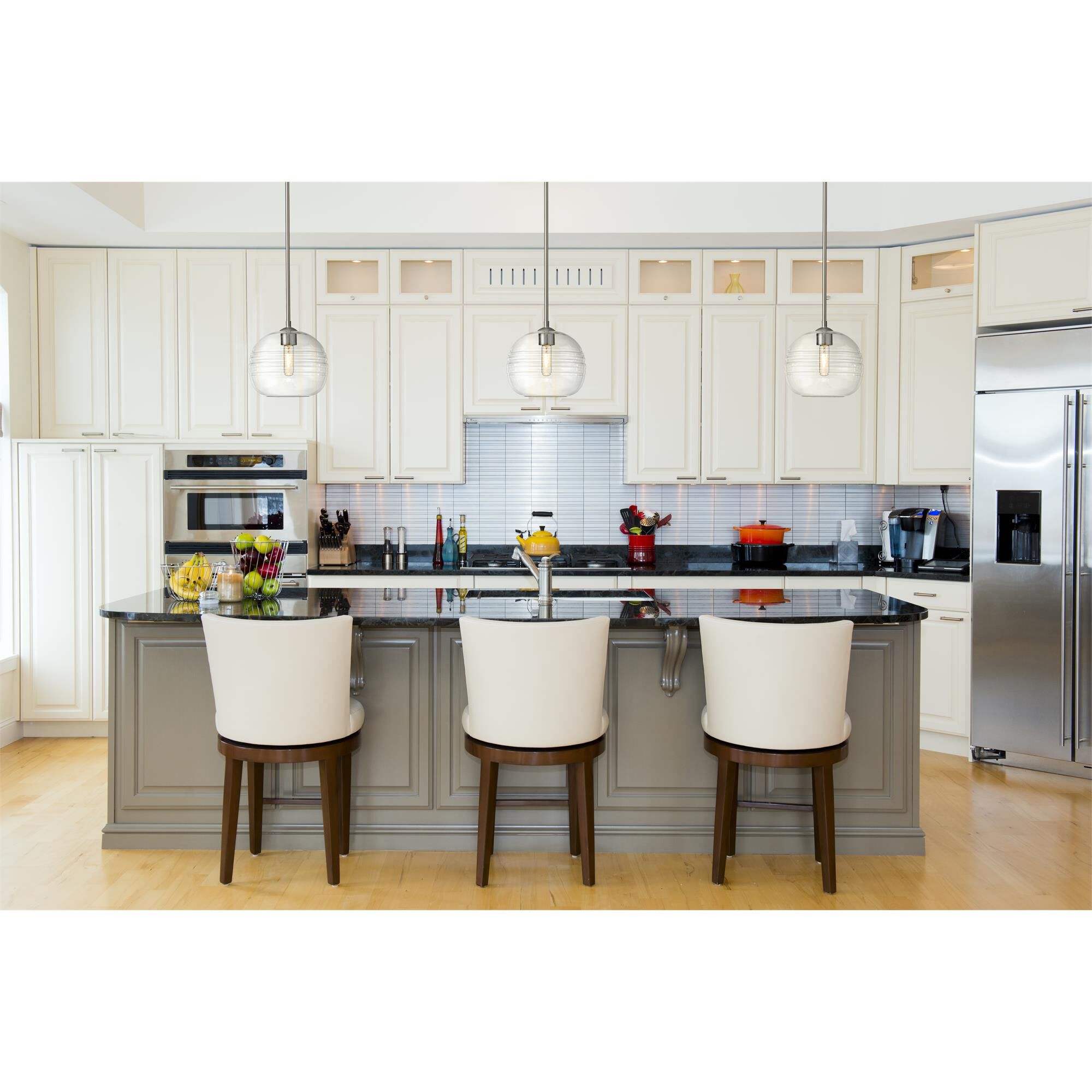 Shown in Brushed Nickel finish and Glass shade