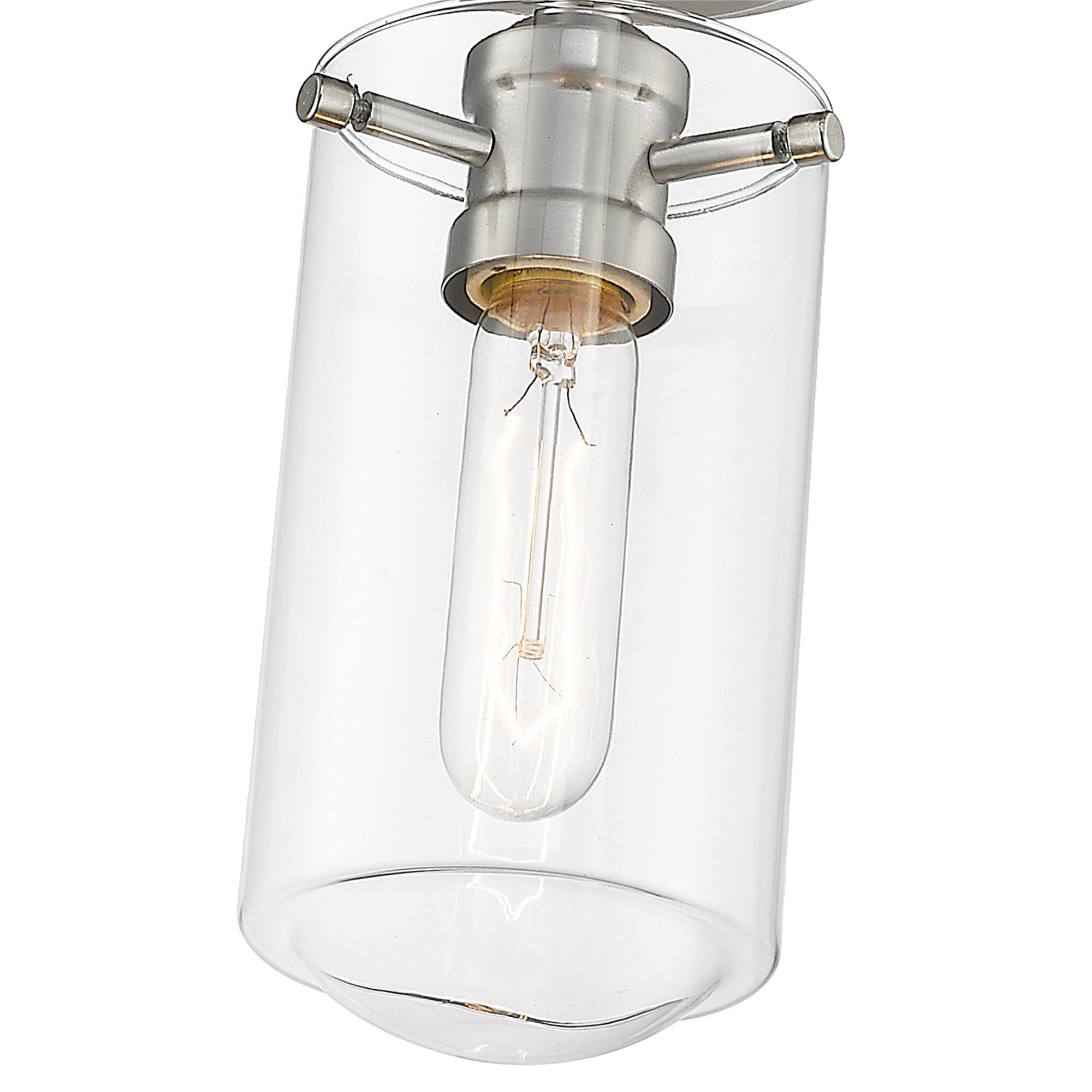 Shown in Brushed Nickel finish and Glass shade
