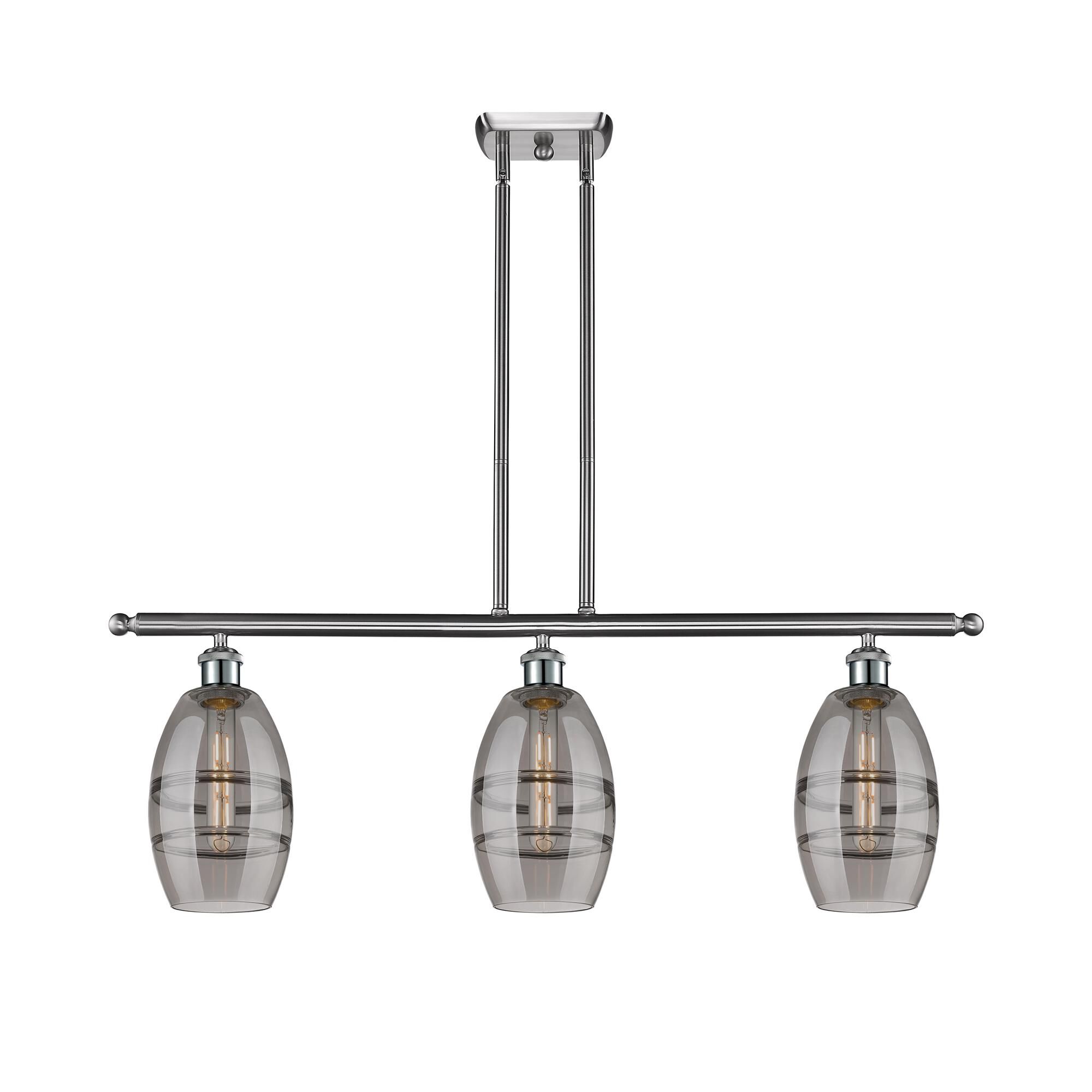 Shown in Brushed Satin Nickel finish and Light Smoke glass