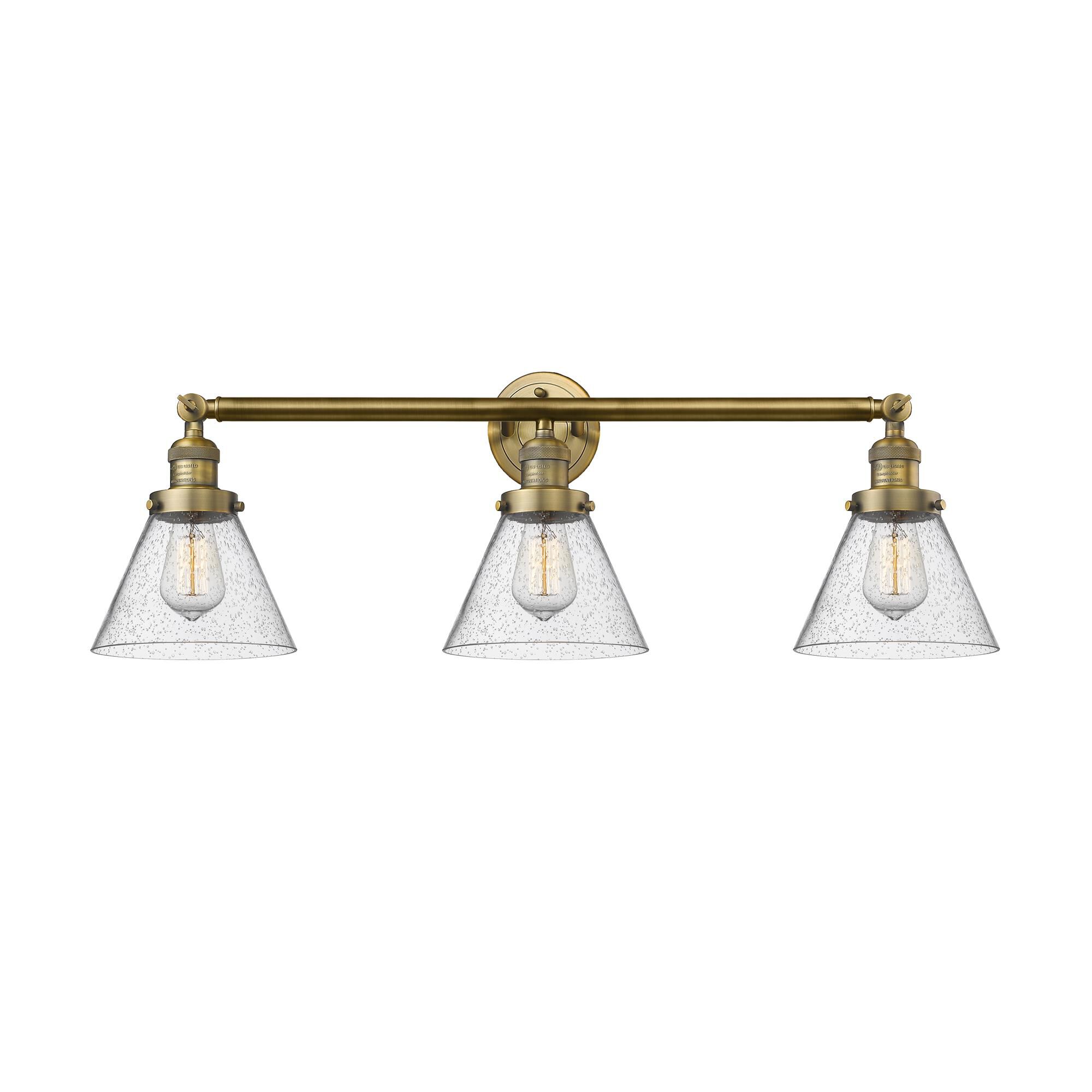 Shown in Brushed Brass finish and Seedy glass