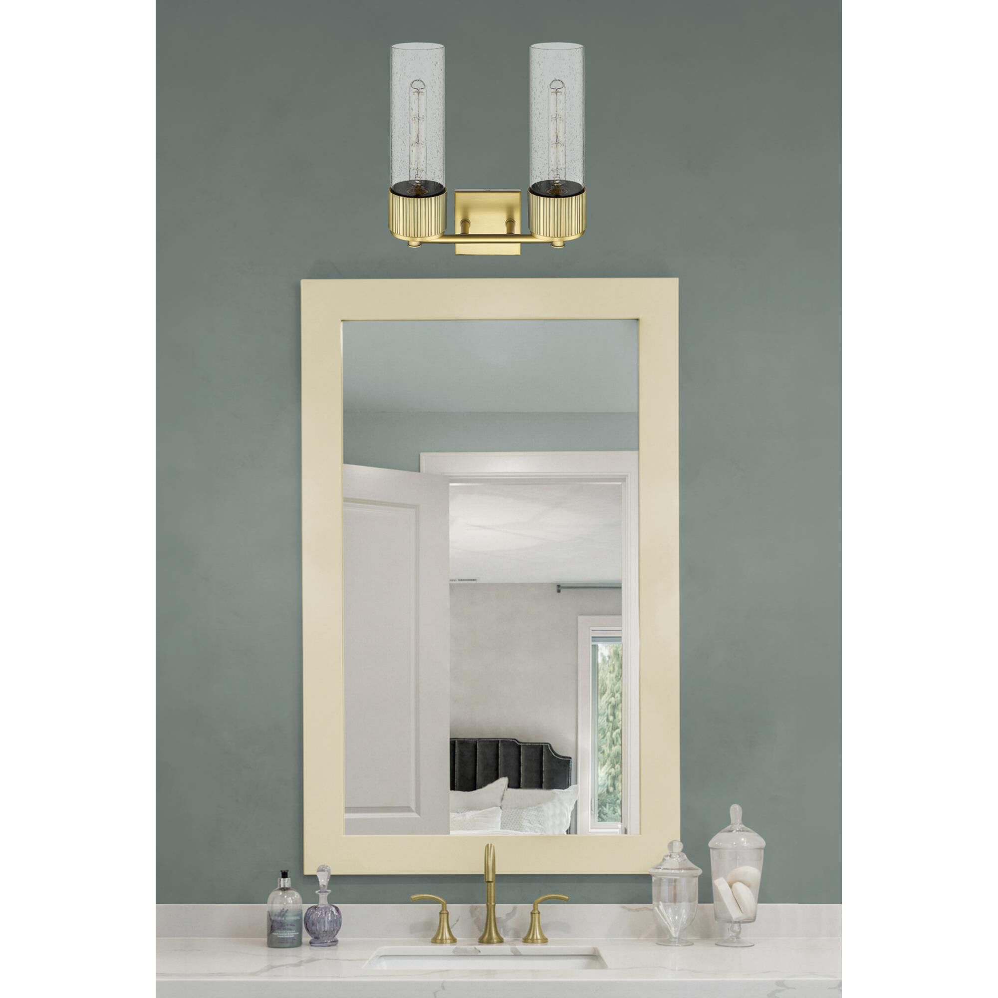 Shown in Brushed Brass finish and Seedy glass