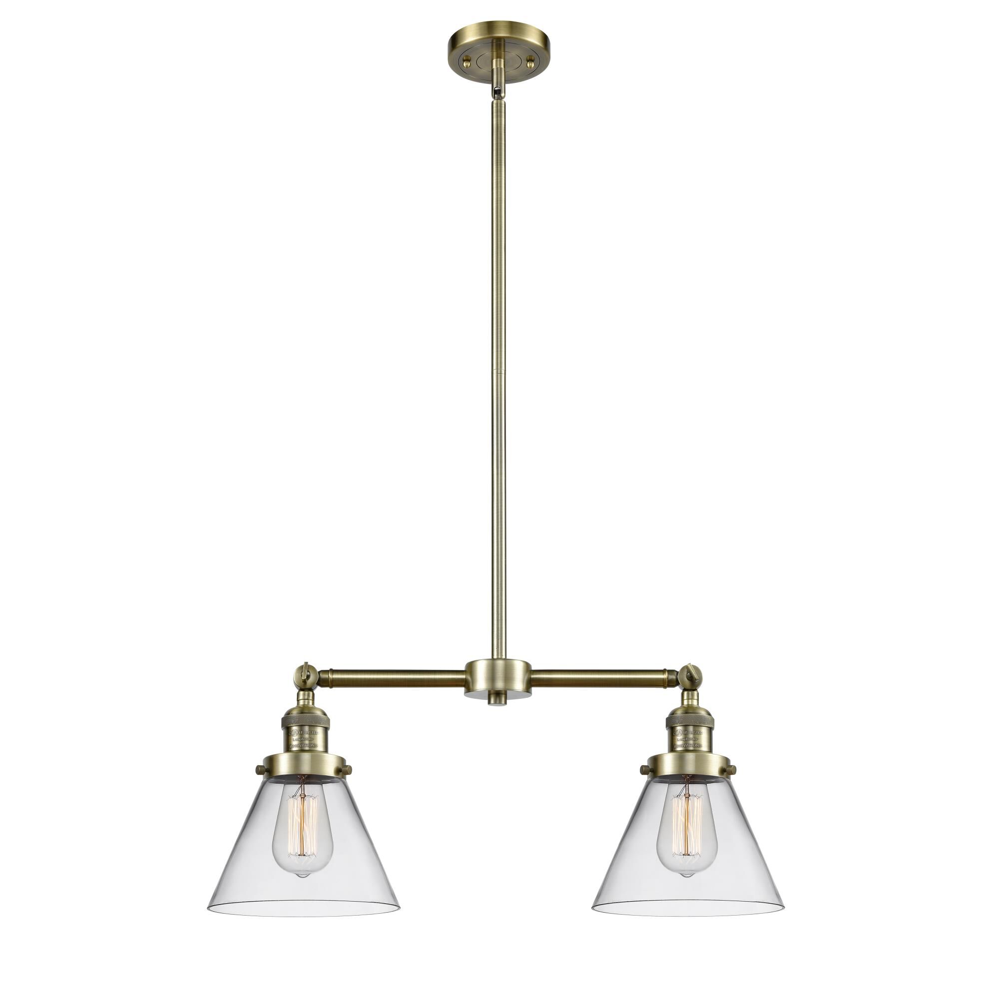 Shown in Antique Brass finish and Clear glass