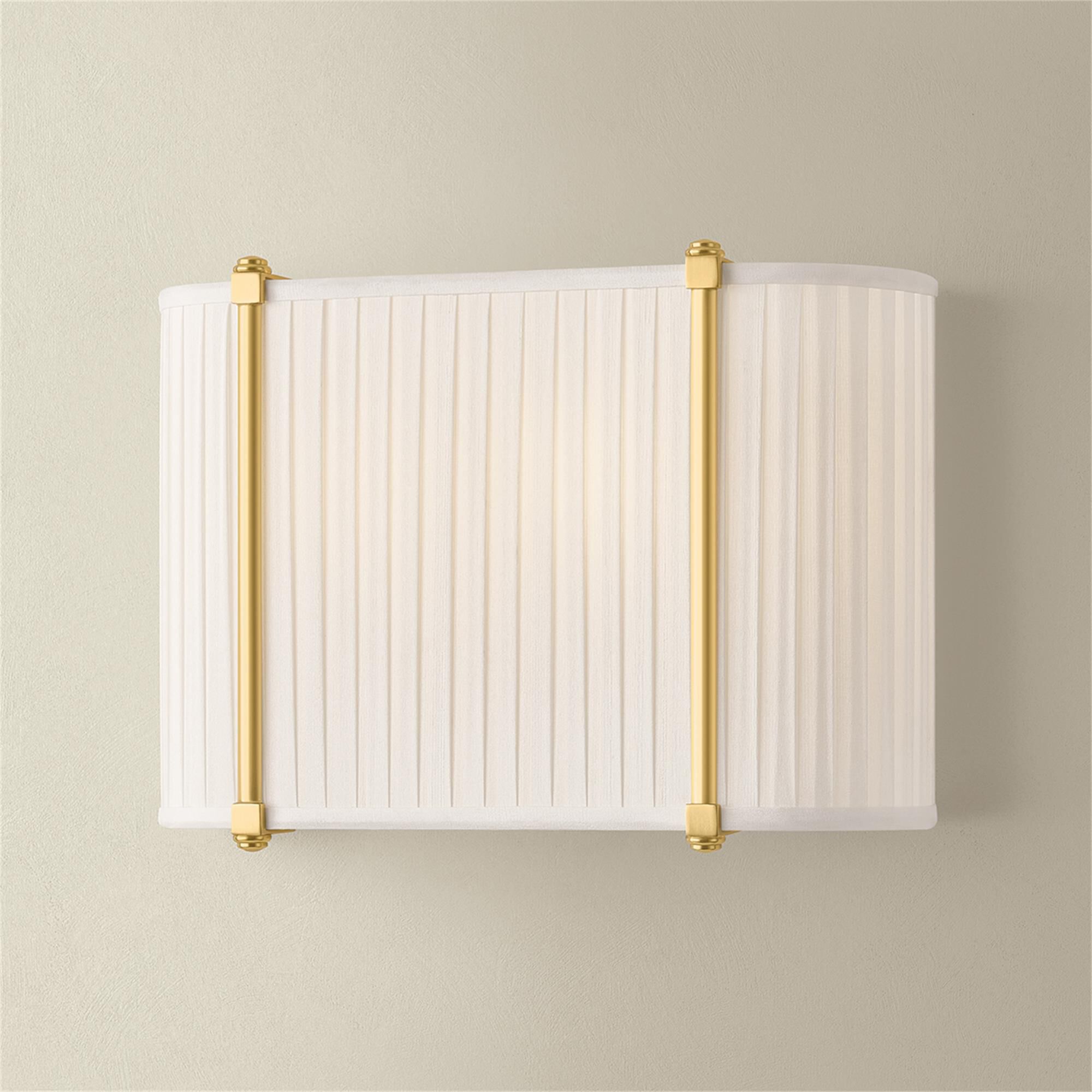 Shown in Aged Brass finish and Ivory Silk shade