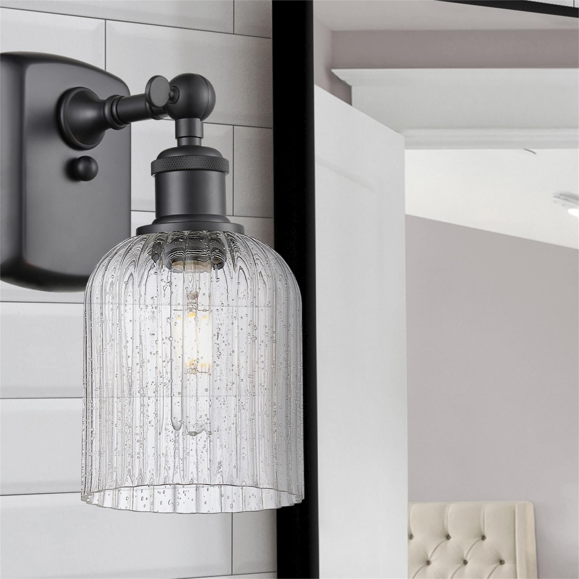 Shown in Matte Black finish and Seedy glass