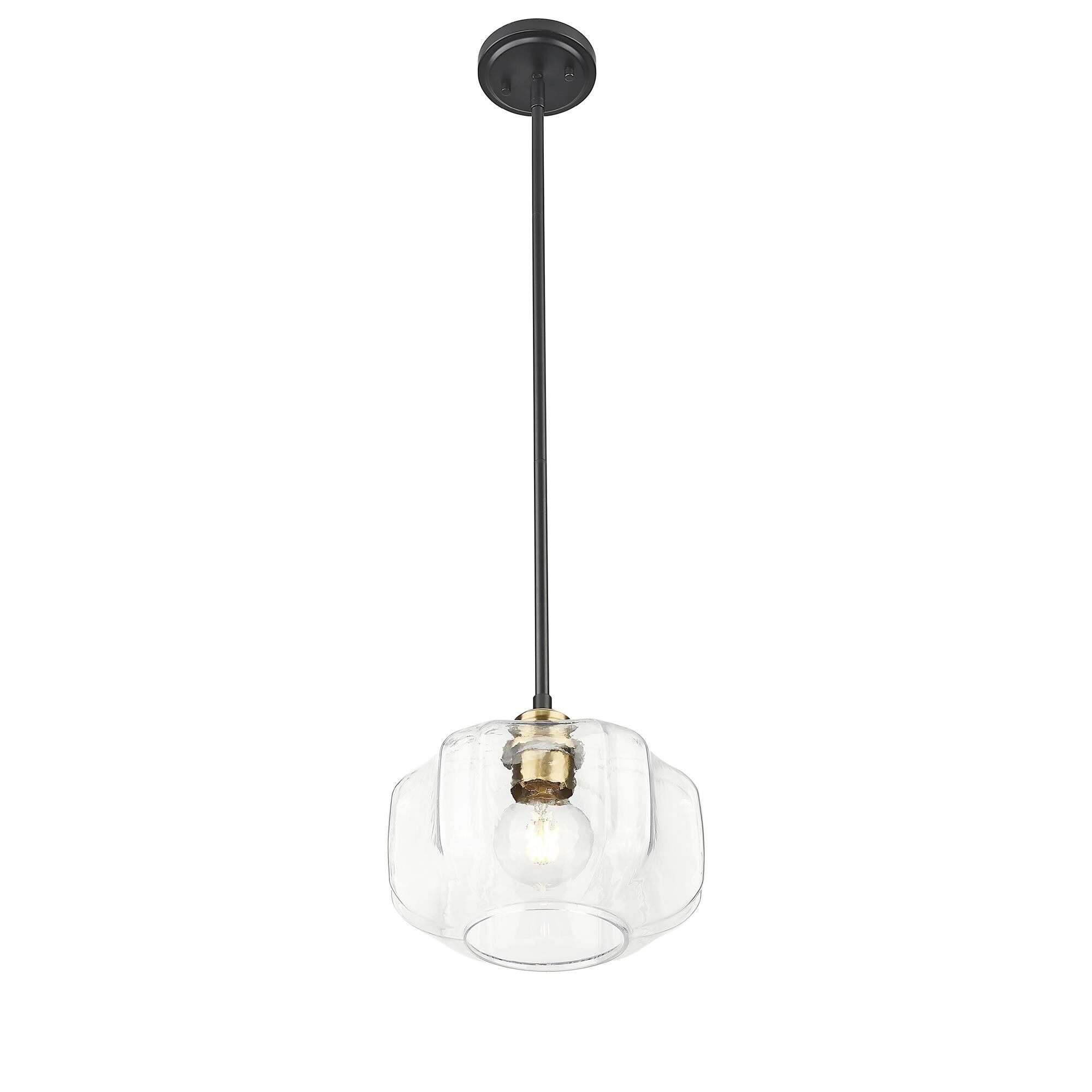 Shown in Matte Black And Brass finish and Clear Glass Globe shade