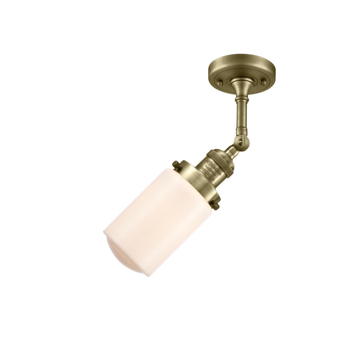 Shown in Antique Brass finish and Schoolhouse glass and Glass shade and Bulb Tint - Amber accent