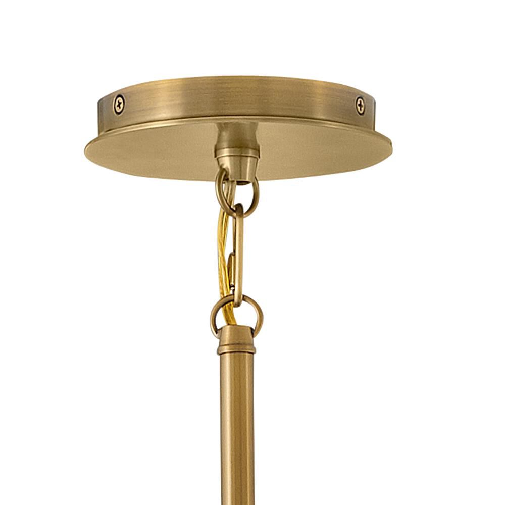 Shown in Heritage Brass finish and Natural Paper shade