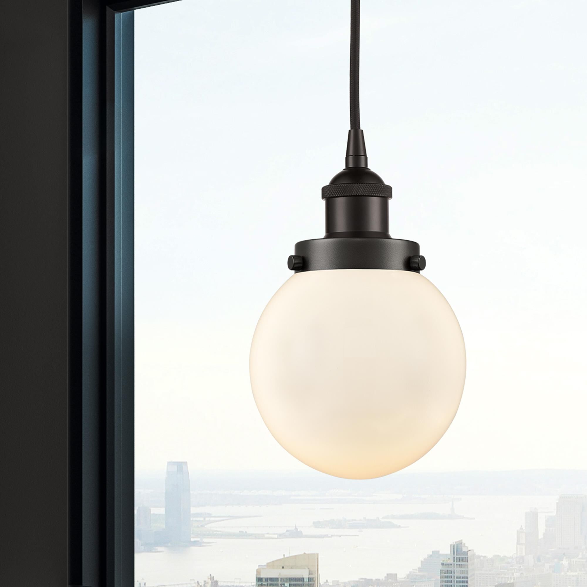 Shown in Oil Rubbed Bronze finish and Matte White glass