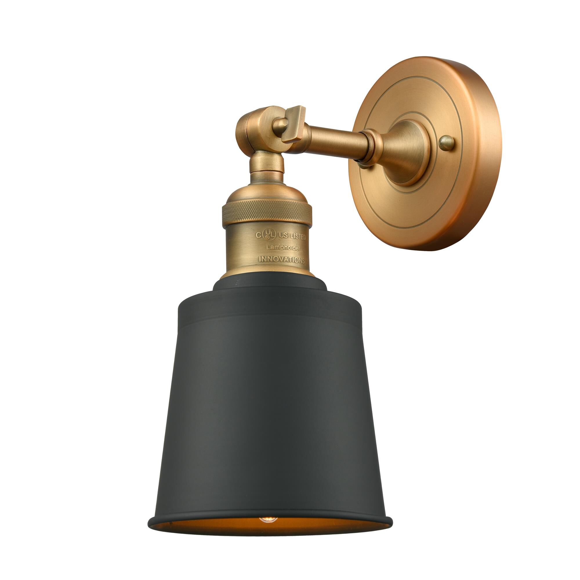 Shown in Brushed Brass finish and Matte Black Metal shade