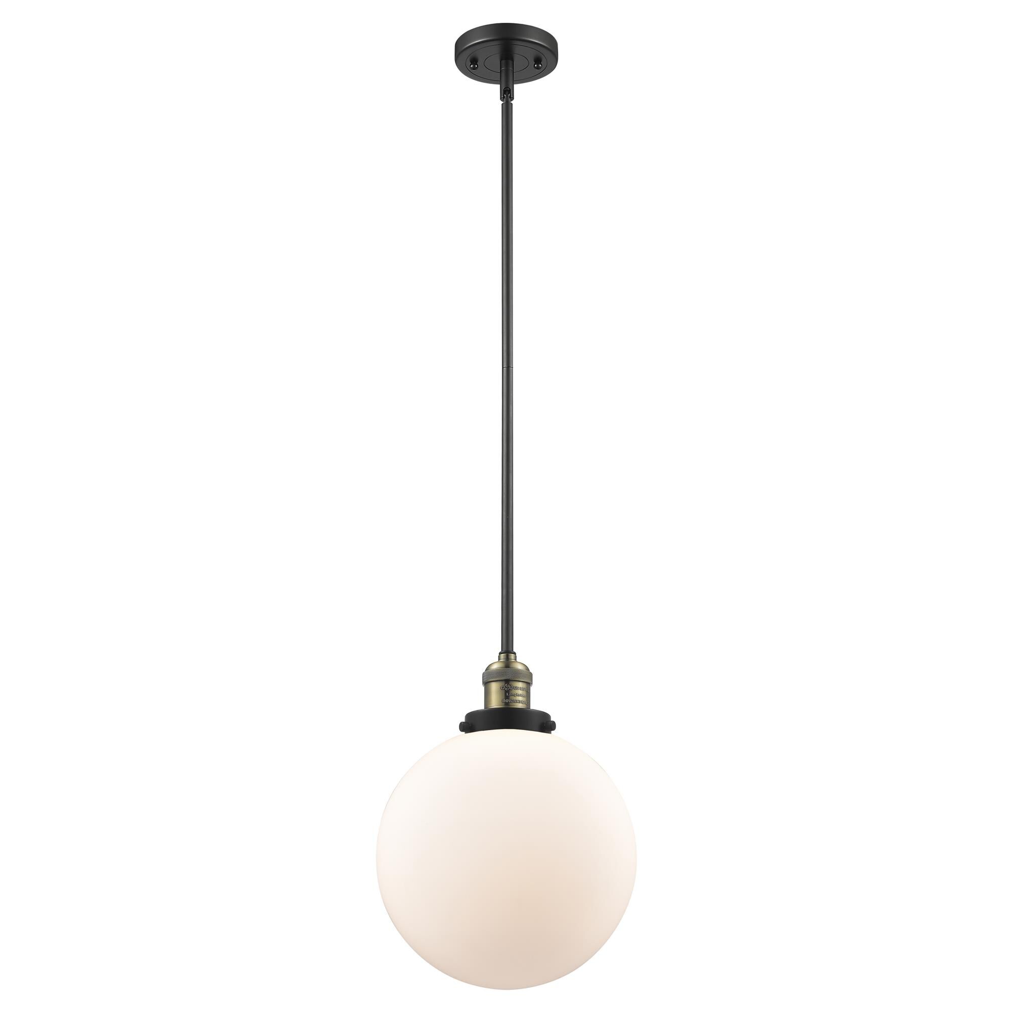 Shown in Black Antique Brass finish and Matte White Cased glass