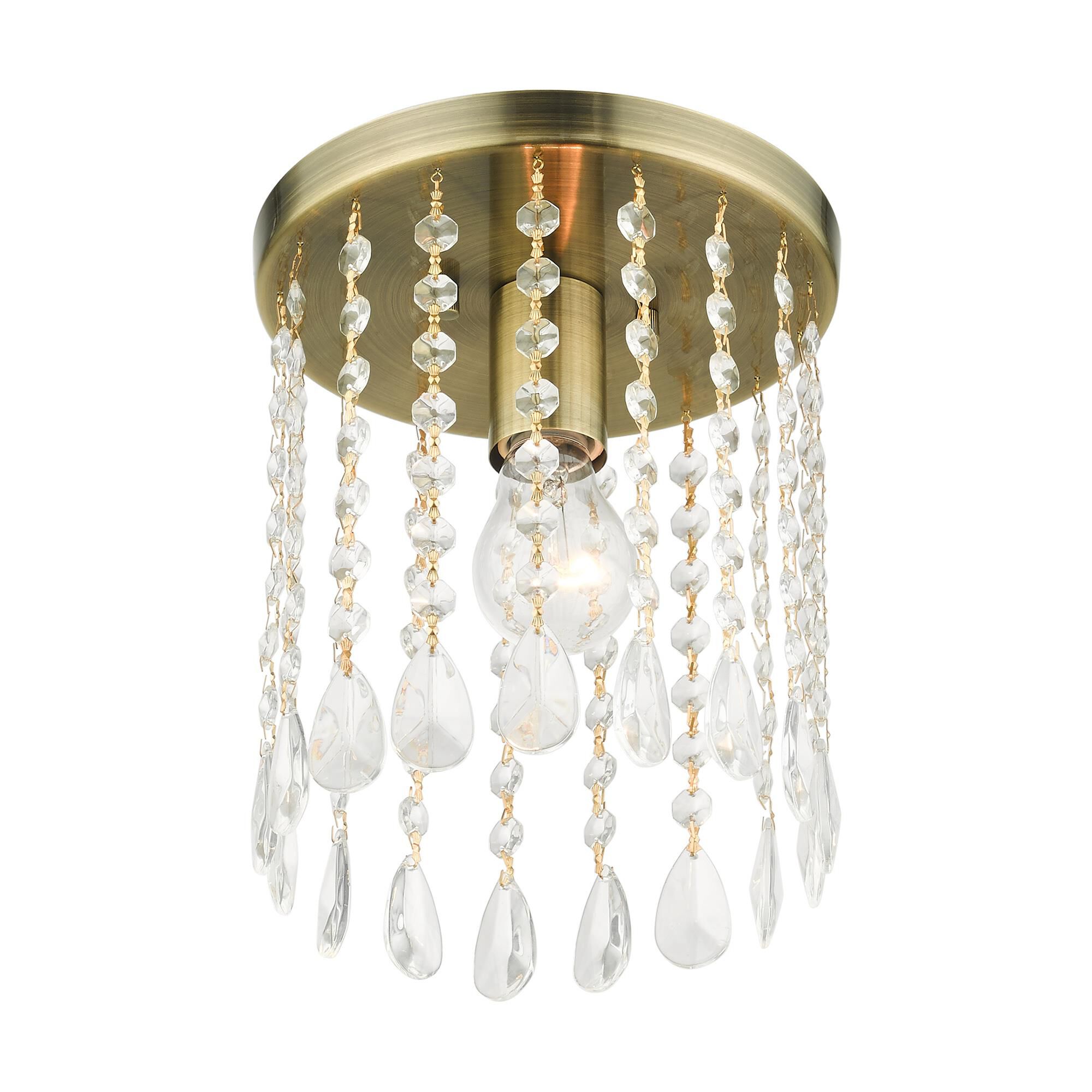 Shown in Antique Brass finish and Hand Assembled Crystal Shade glass