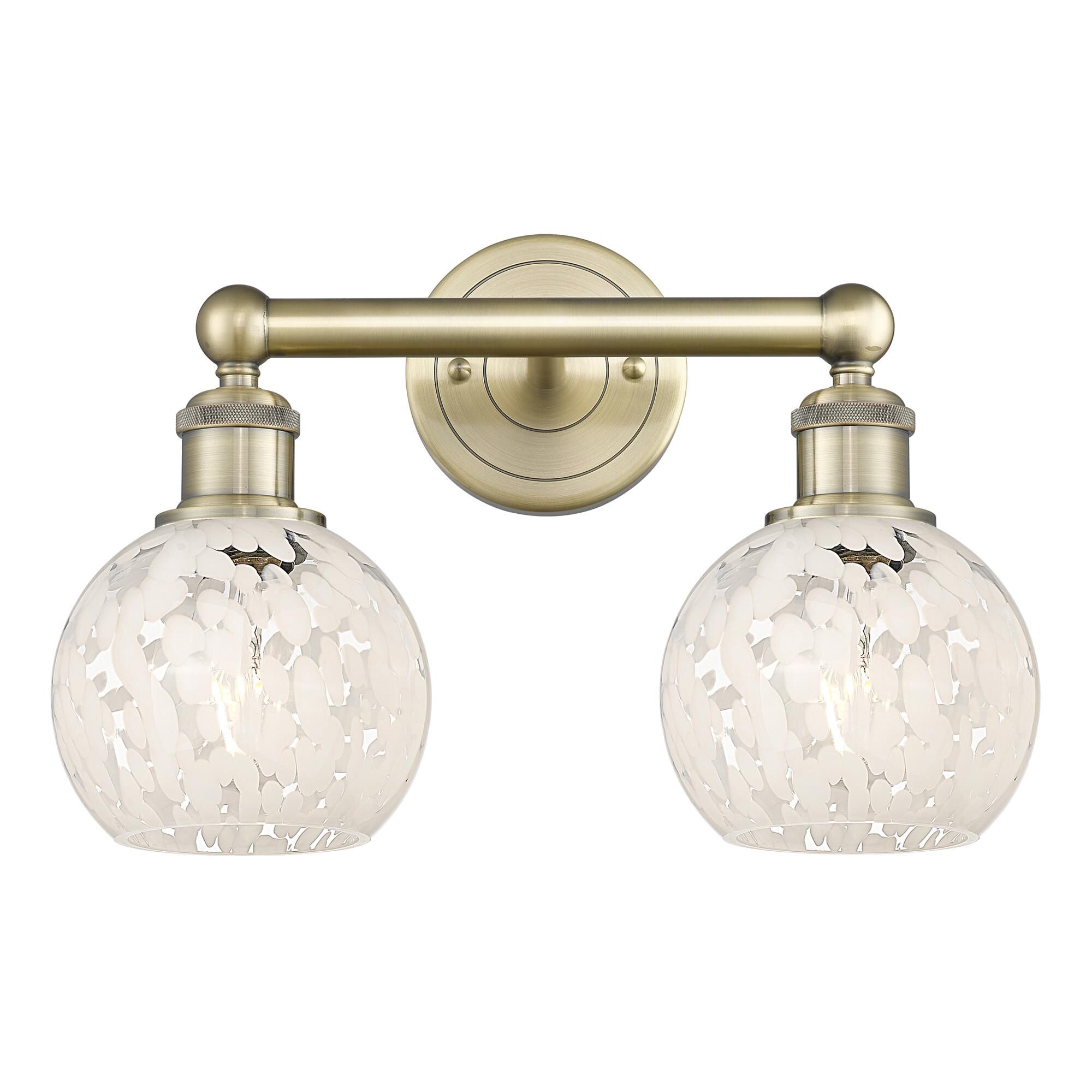 Shown in Antique Brass finish and White Mouchette glass