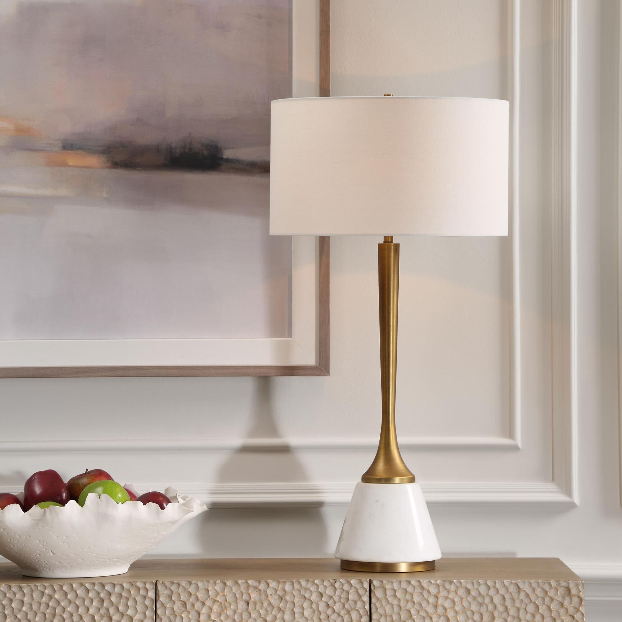 Shown in This Table Lamp Showcases A Fusion Of Refined White Marble And Plated Antique Brass. With Its Elegan finish and Round Drum Hardback shade