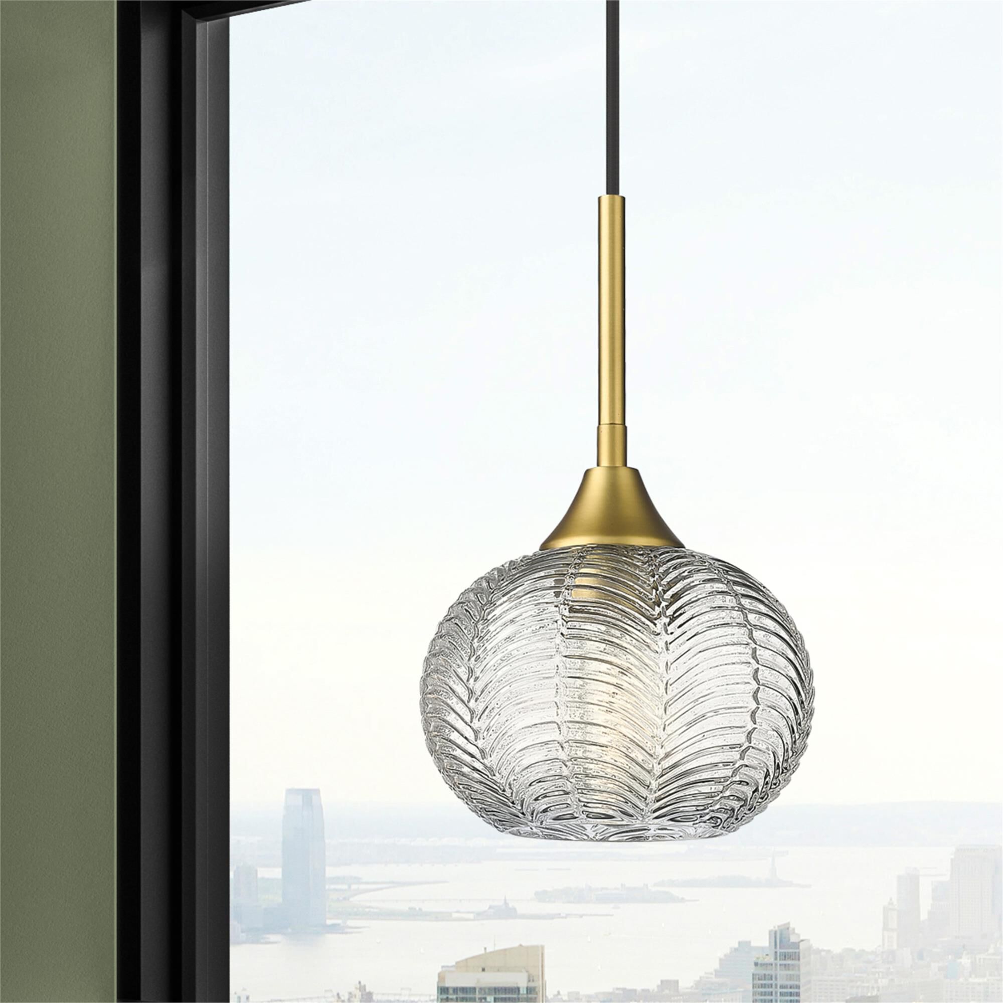 Shown in Brushed Brass finish and Clear glass