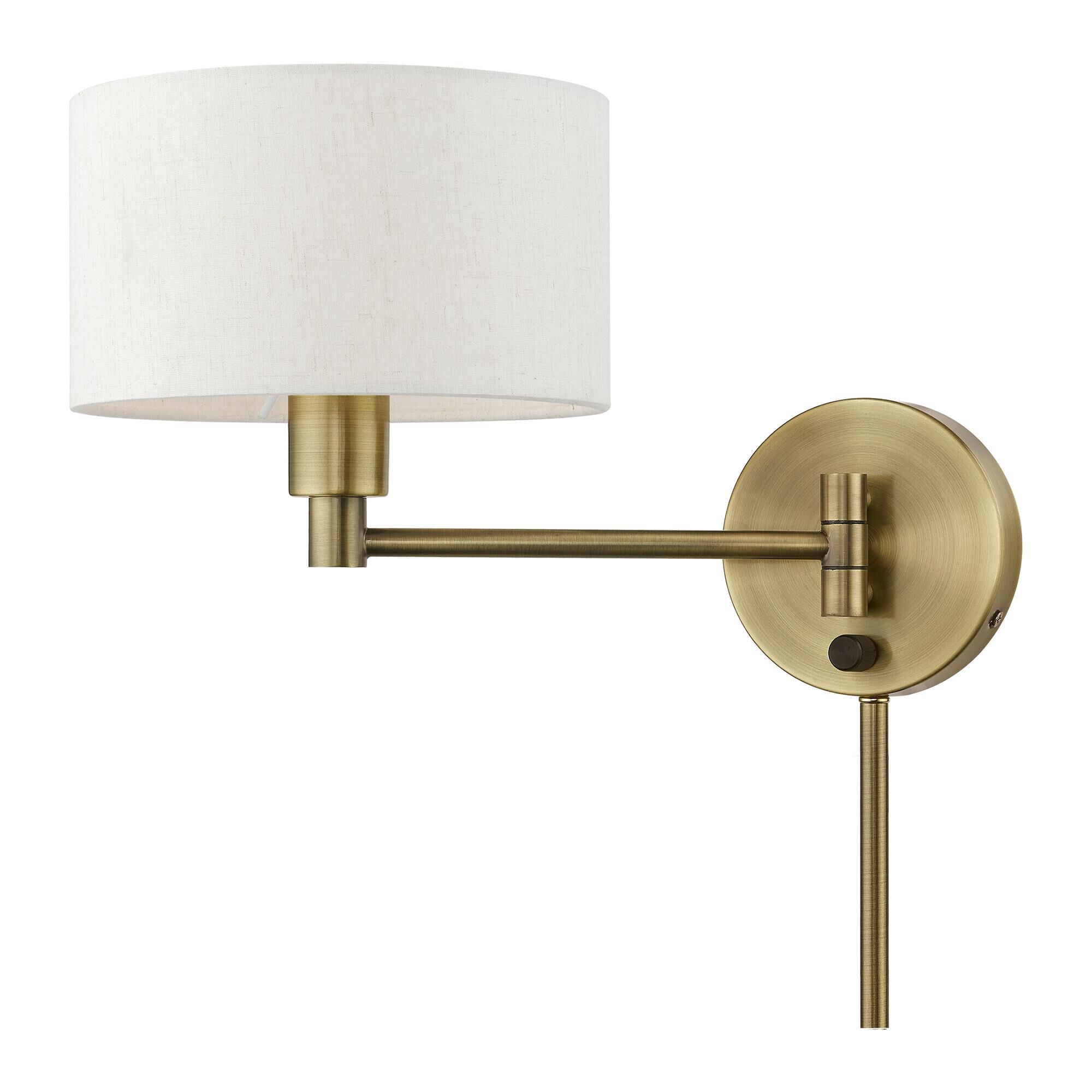 Shown in Antique Brass finish and Hand Crafted Oatmeal Color Hardback Fabric shade