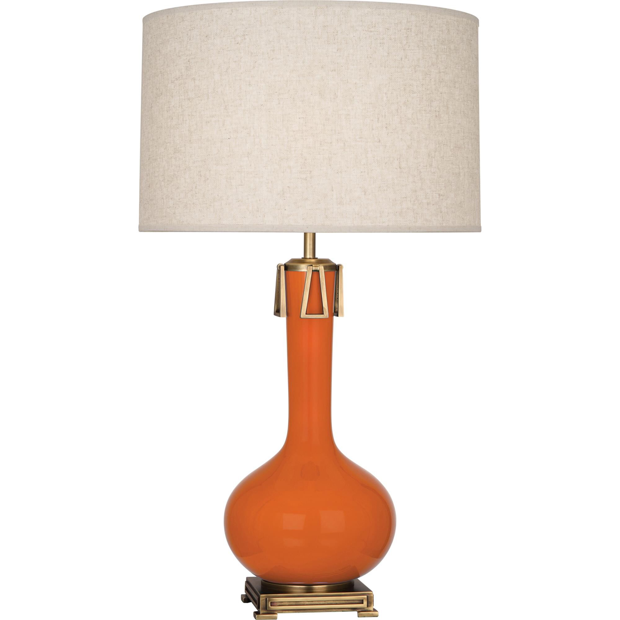 Shown in Pumpkin Glazed Ceramic With Aged Brass Accents finish and Open Weave Heather Linen shade