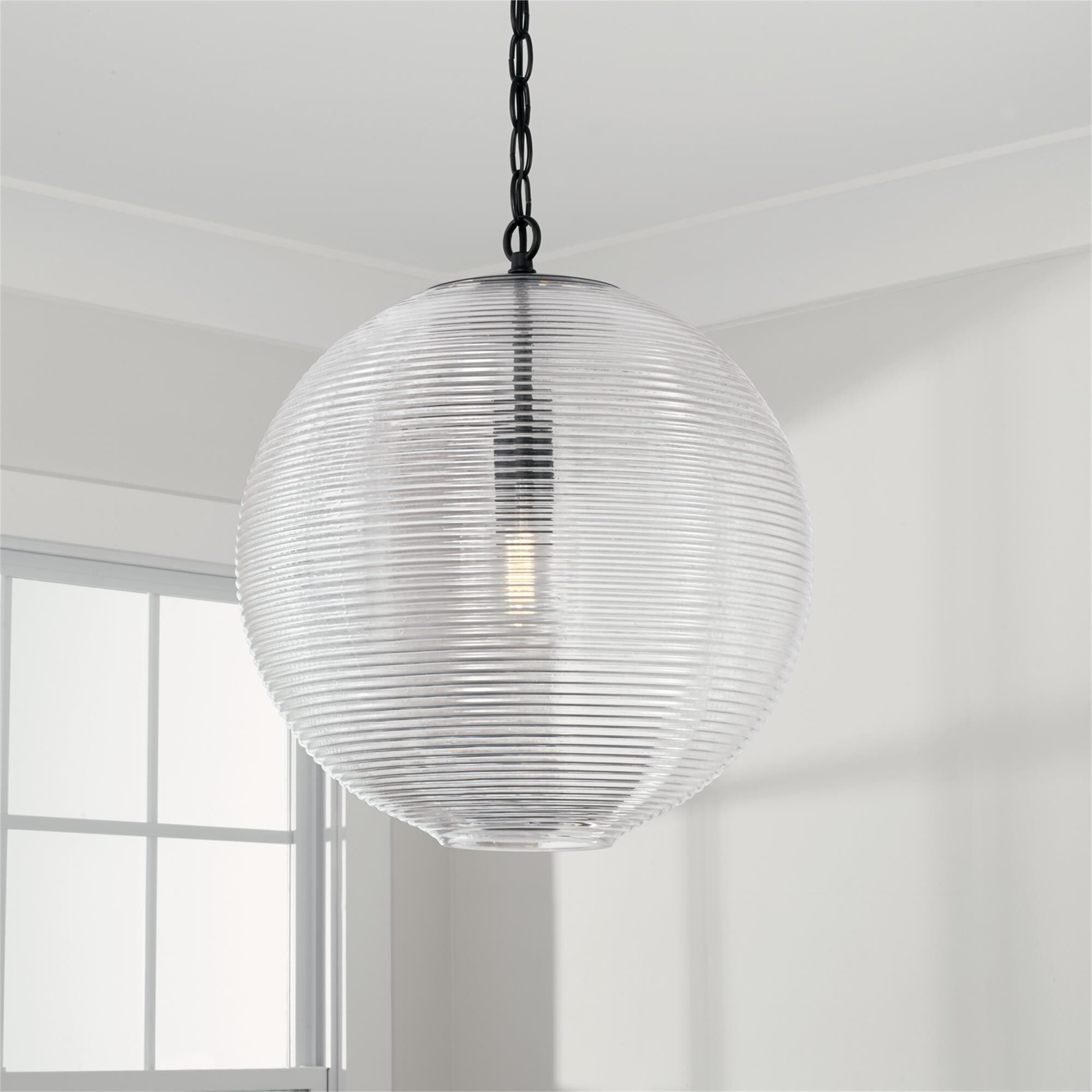 Shown in Matte Black finish and Clear Ribbed glass
