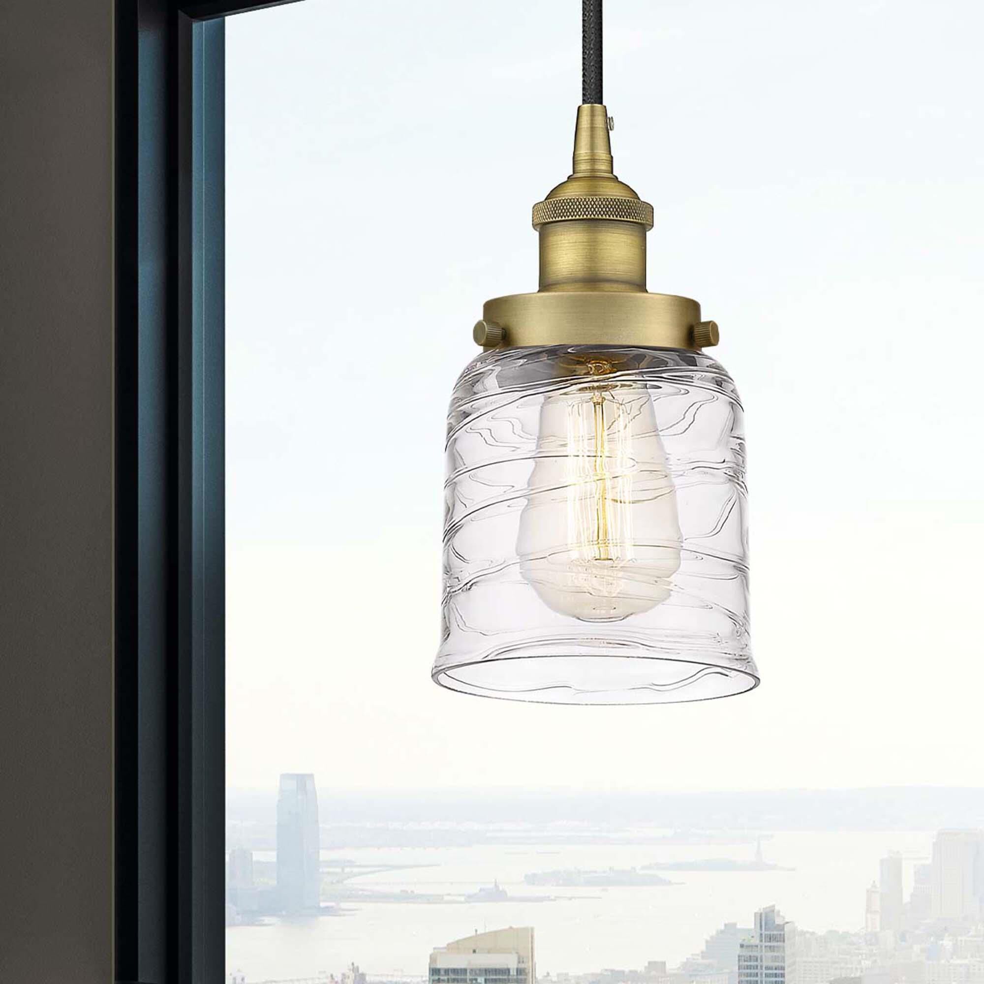 Shown in Brushed Brass finish and Clear glass