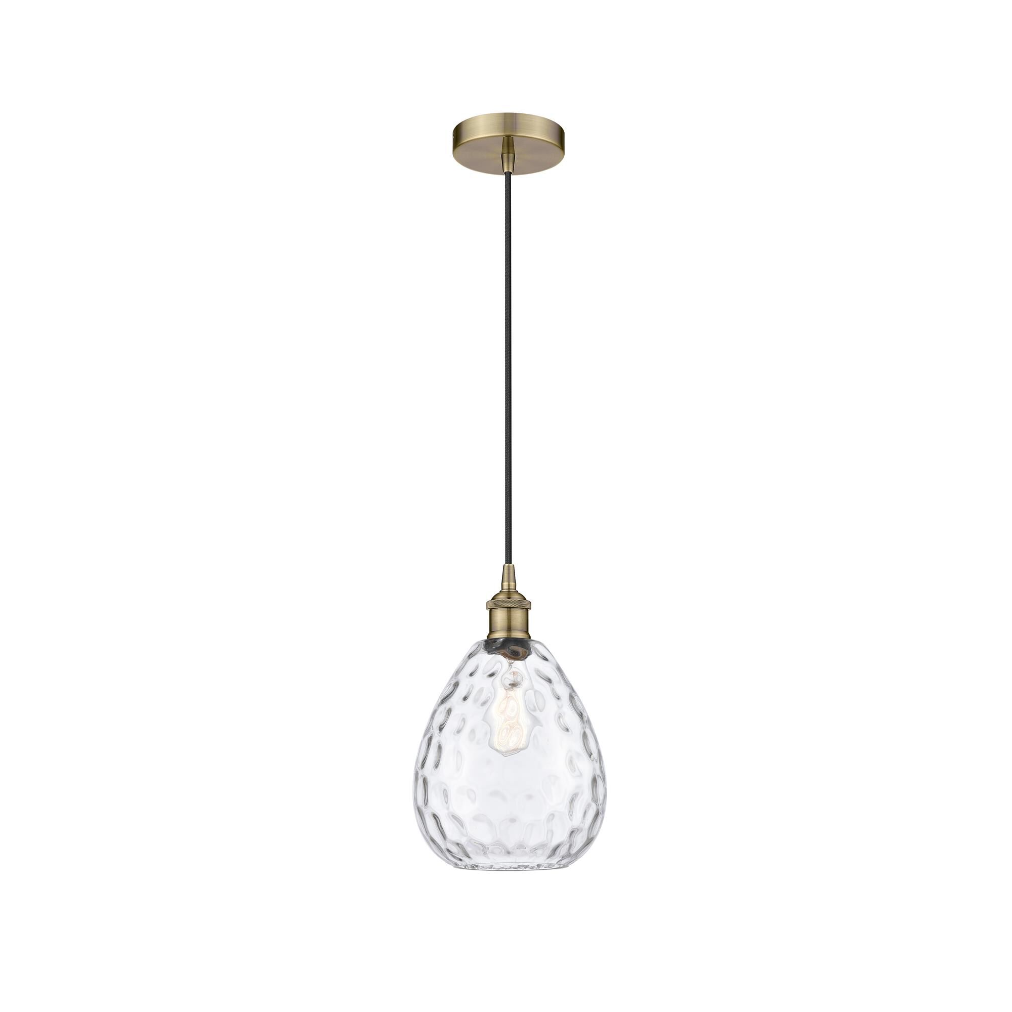 Shown in Antique Brass finish and Clear Large Waverly glass
