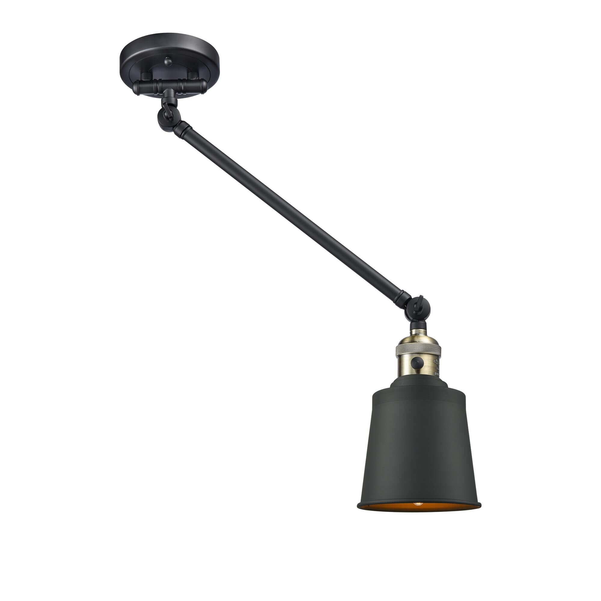 Shown in Black Antique Brass finish and Matte Black shade