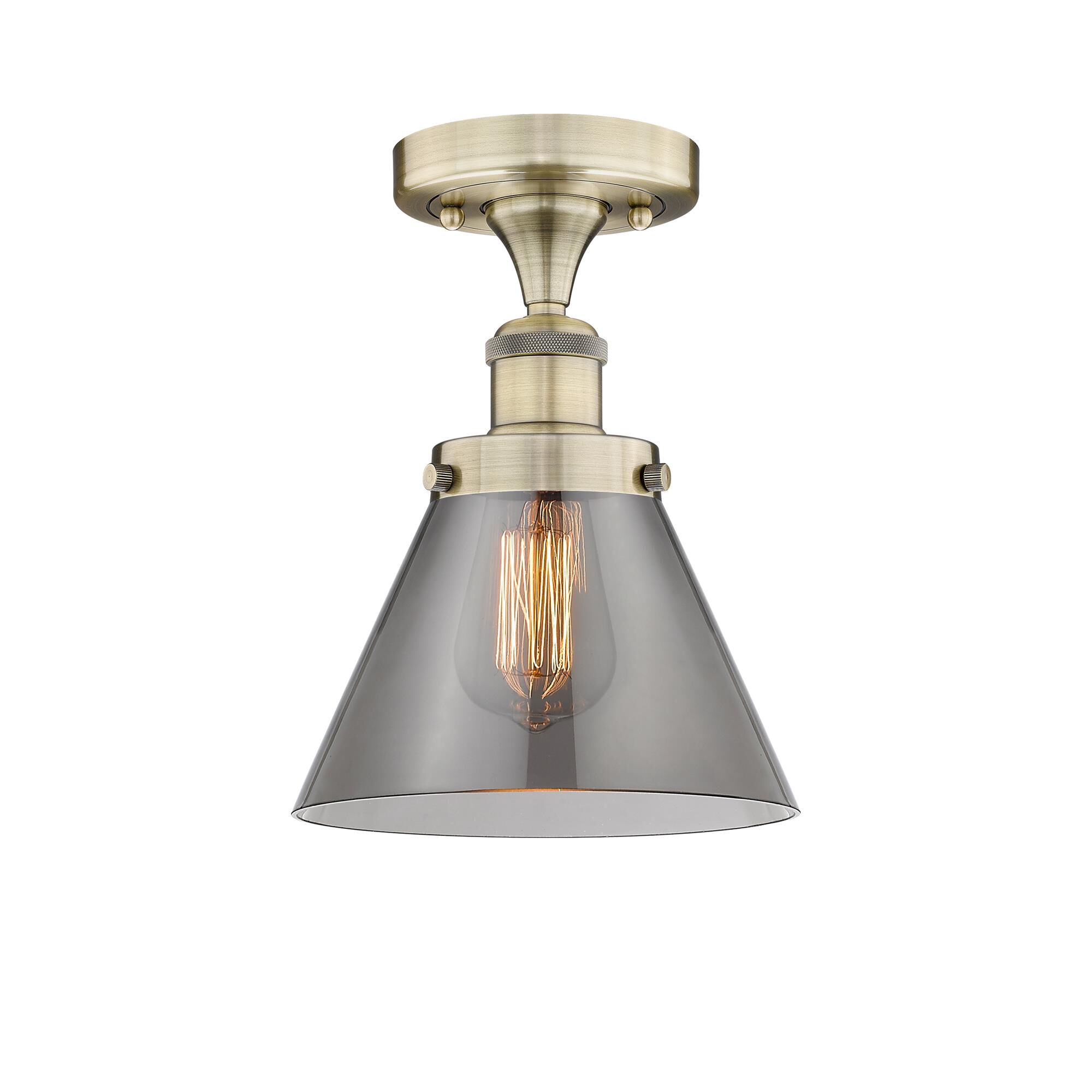 Shown in Antique Brass finish and Plated Smoke glass