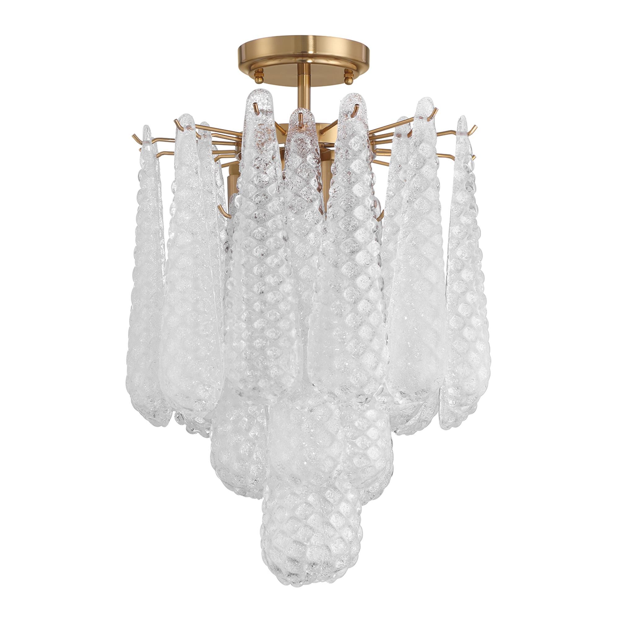 Shown in Aged Brass finish and Sand Clear glass