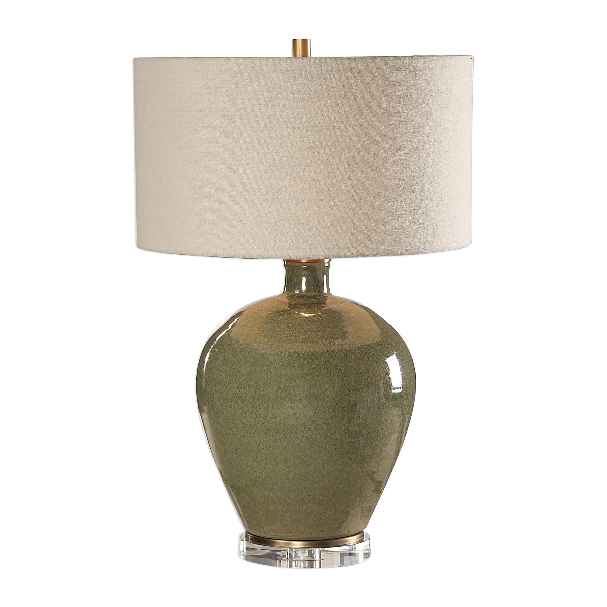 Shown in This Ceramic Base Is Finished In A Distressed Emerald Green Glaze, Accented With Antique Brass Plate finish and Round Hardback Drum shade