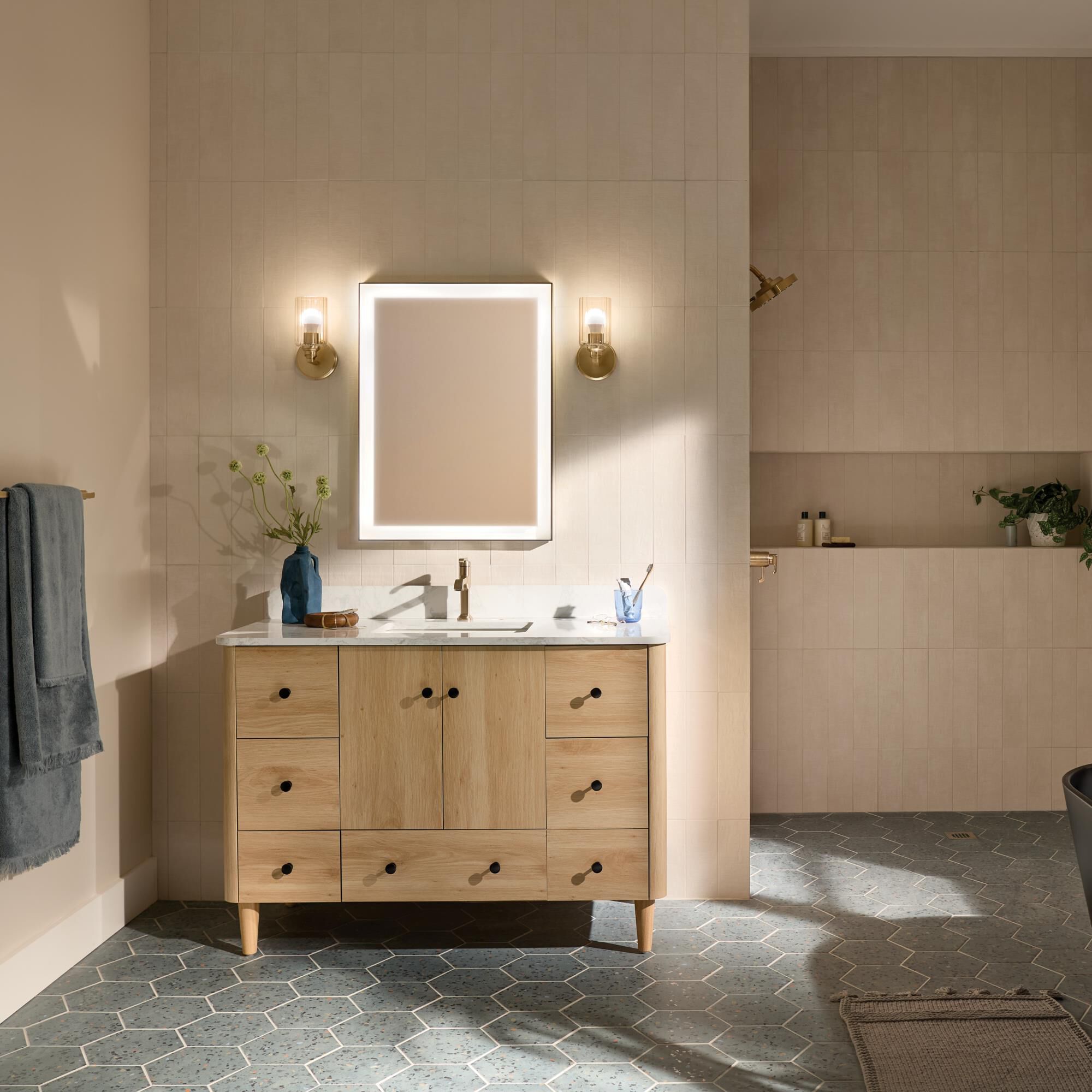 Shown in Champagne Bronze finish and Clear Fluted glass