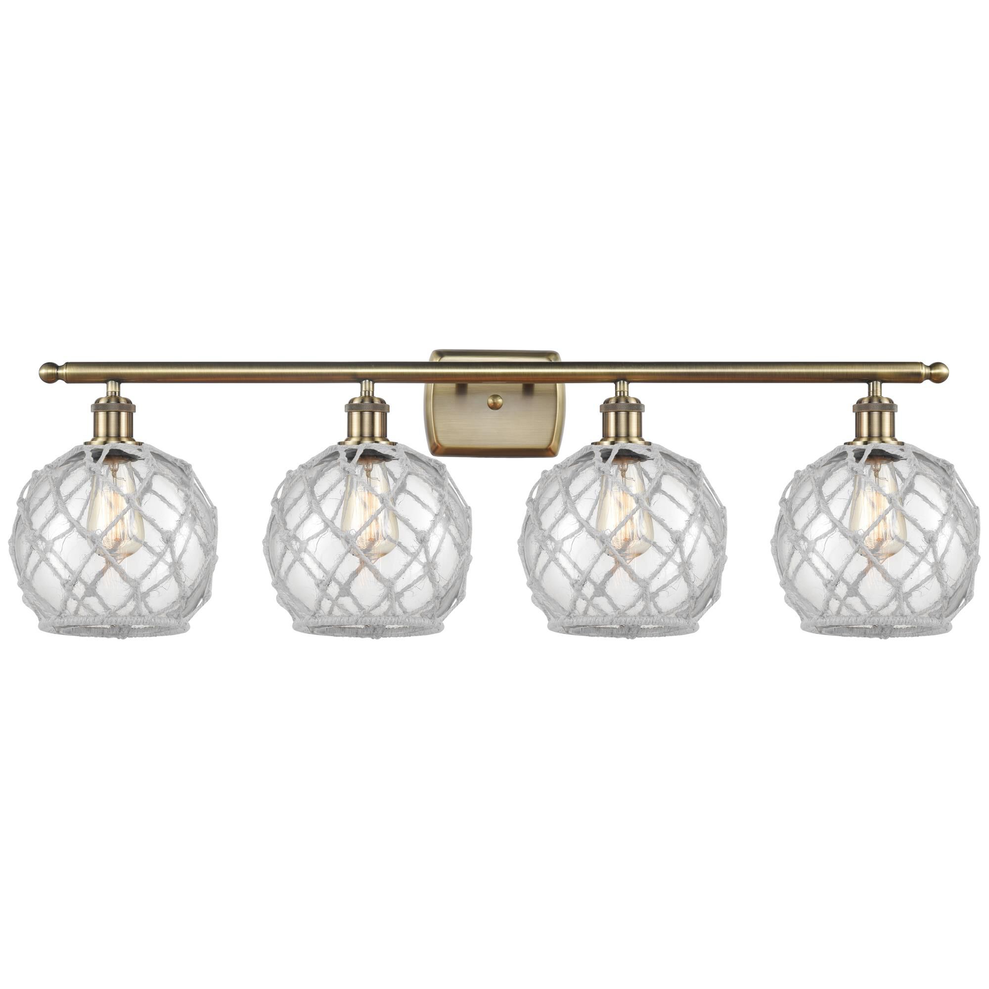 Shown in Antique Brass finish and Clear with White Rope glass