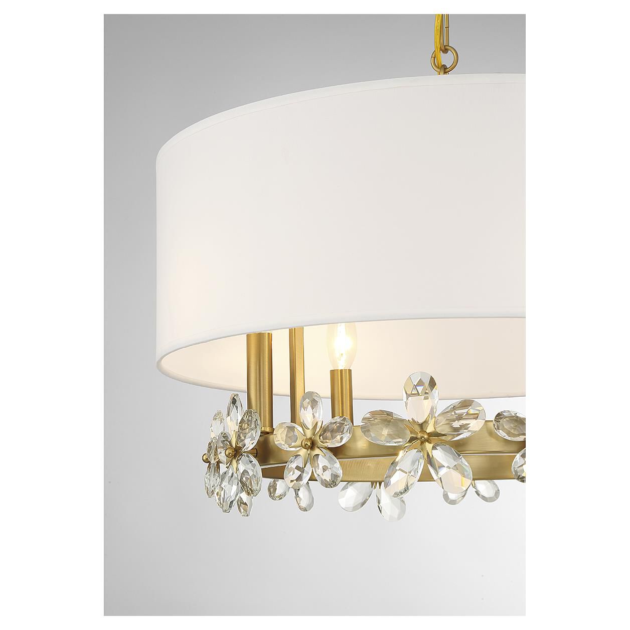 Shown in Warm Brass finish and Clear crystal and White Linen Fabric shade