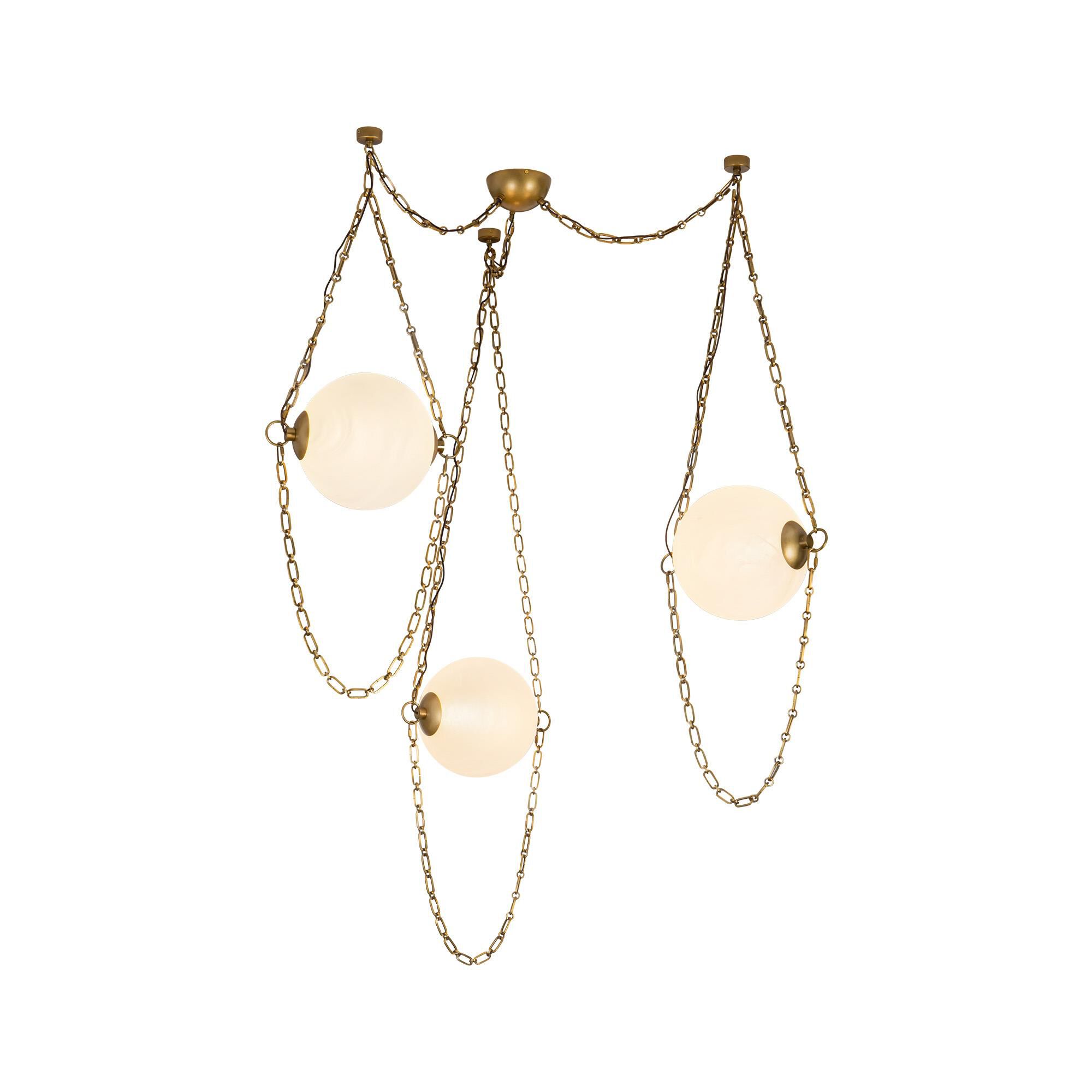 Shown in Vintage Brass finish and Cloud glass