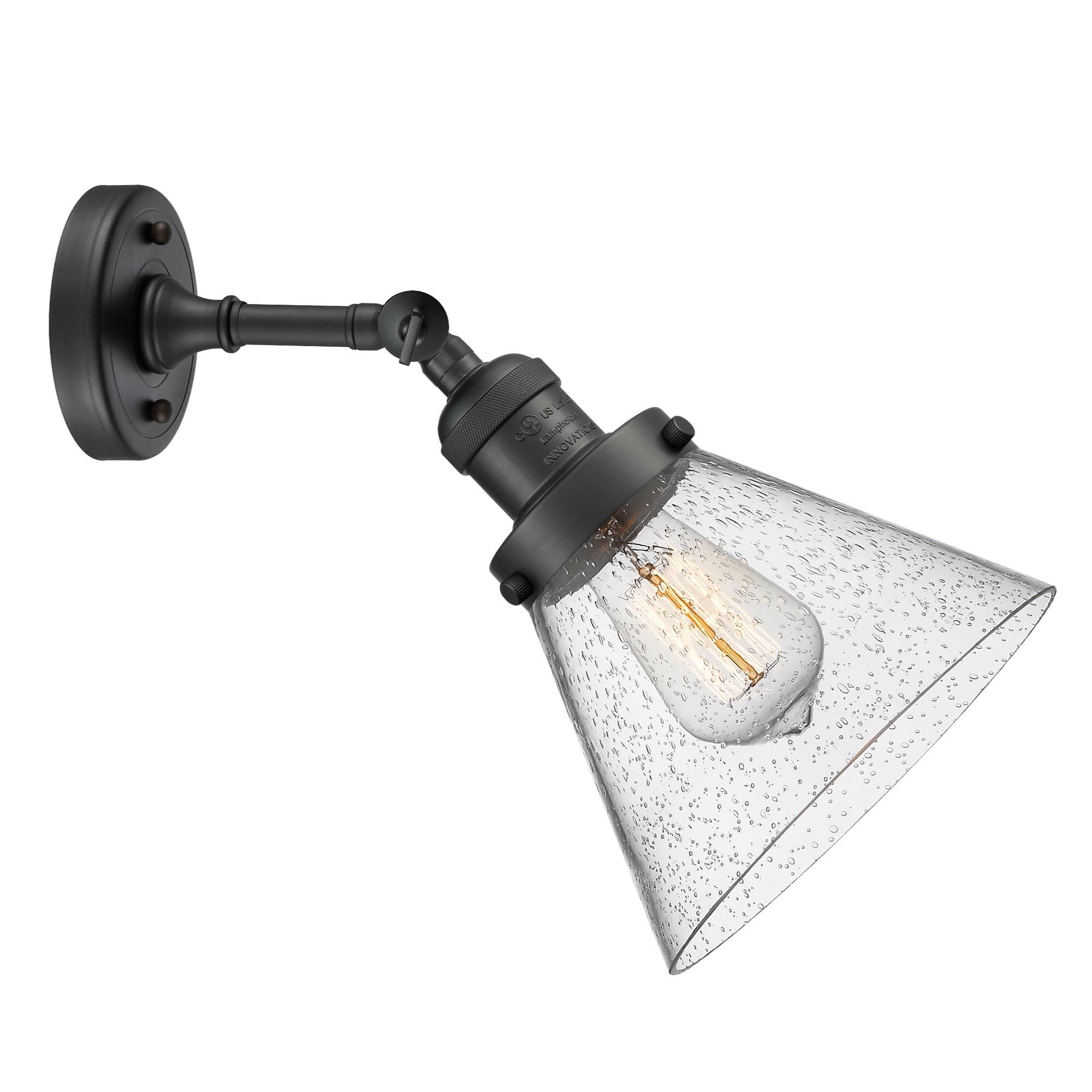 Shown in Matte Black finish and Seedy glass and Brushed Satin Nickel shade and No Accent accent