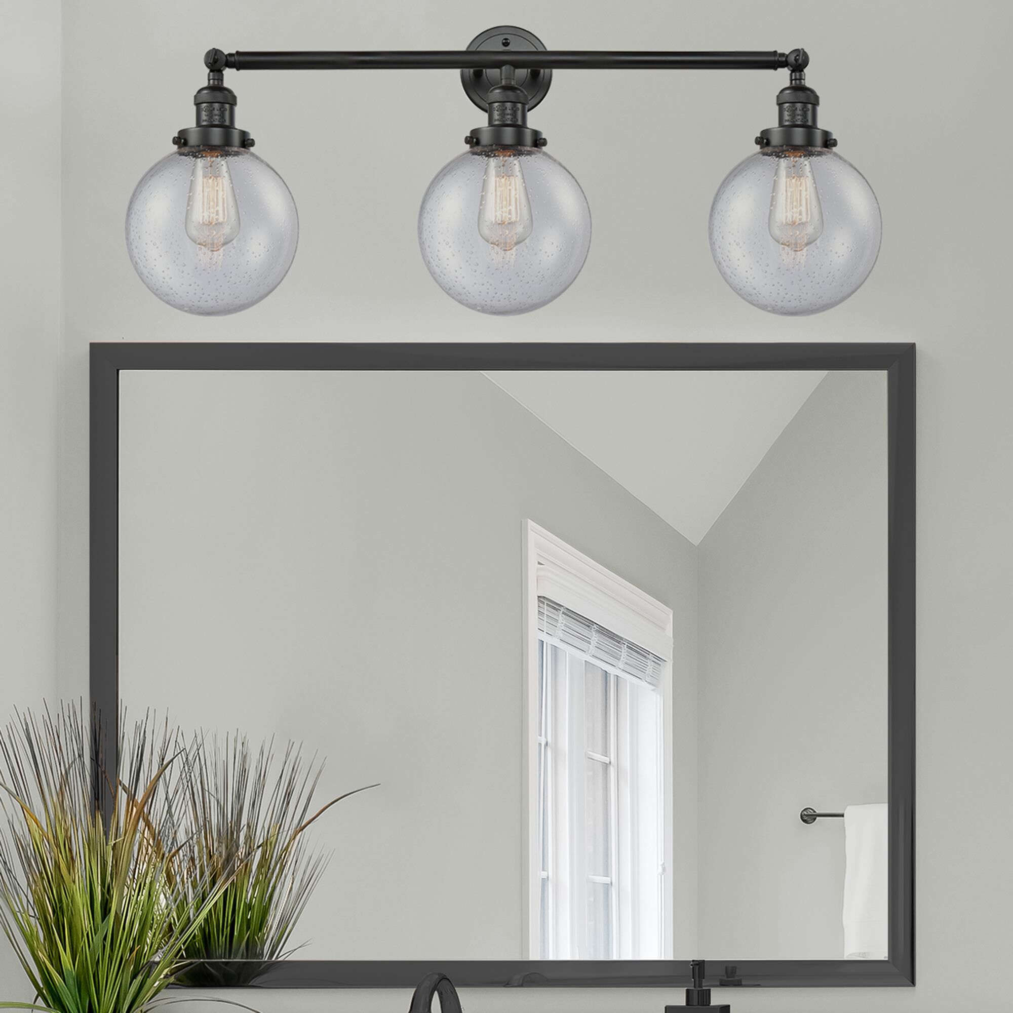 Shown in Matte Black finish and Seedy Beacon glass