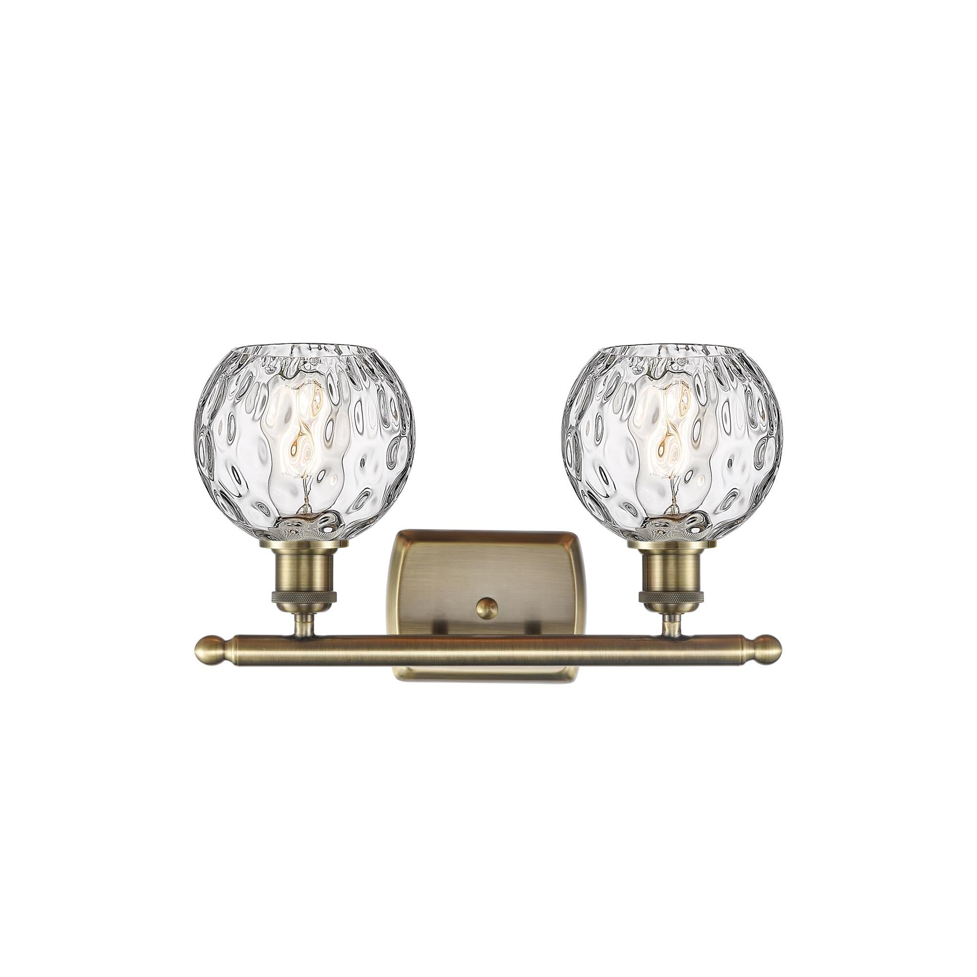 Shown in Antique Brass finish and Clear glass